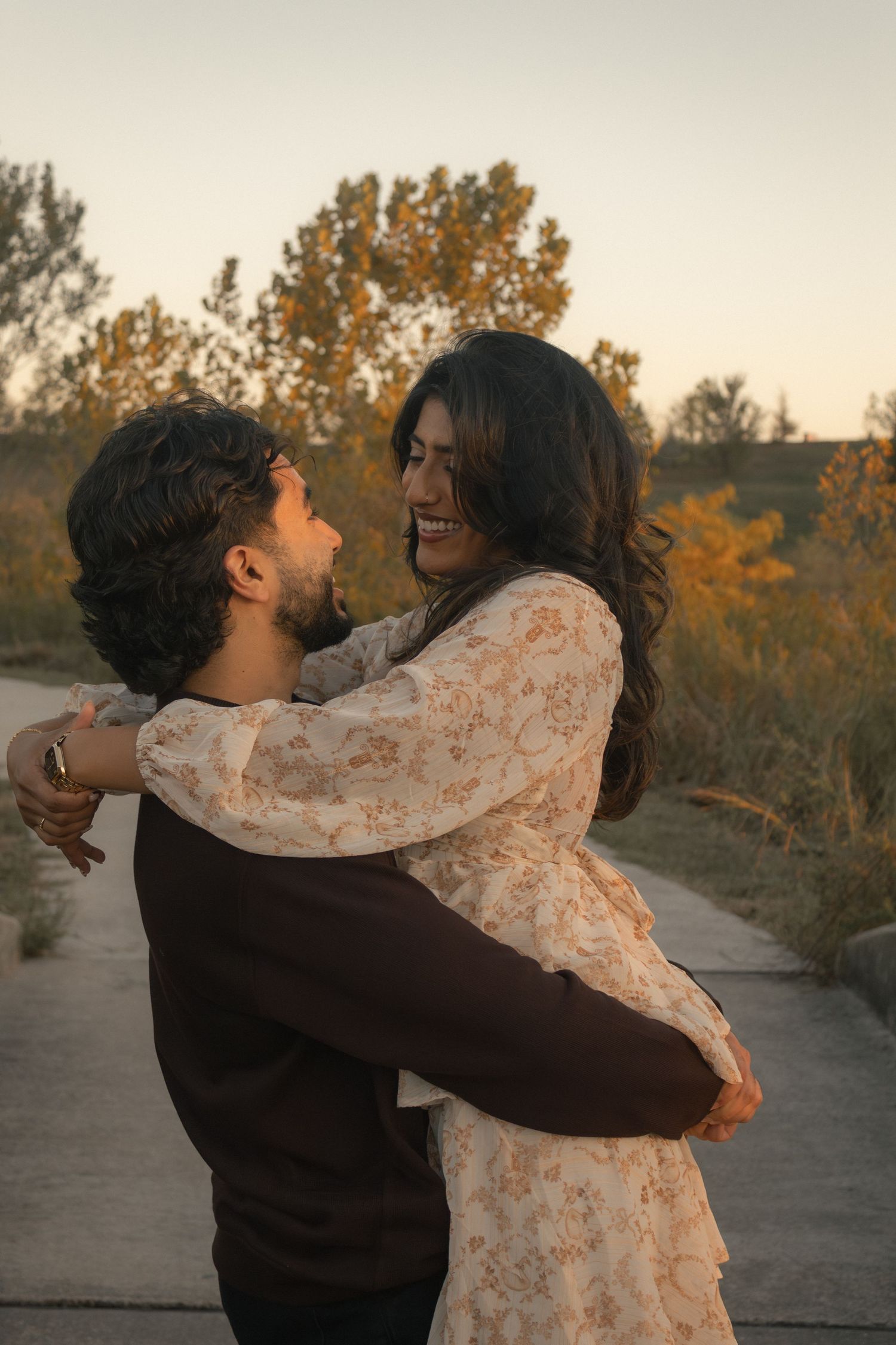 a girl being held by her man