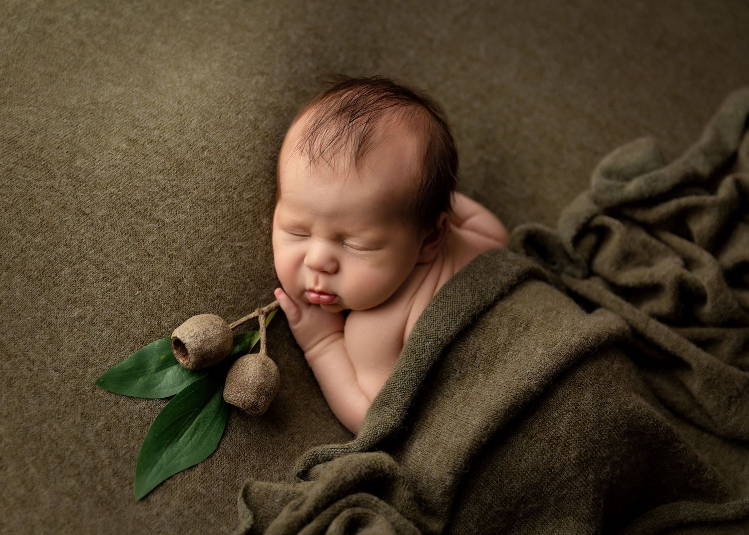 Artistic newborn photography series on dark textured background with minimalist stylingToowoomba Photographer Toowoomba Newborn Photographer