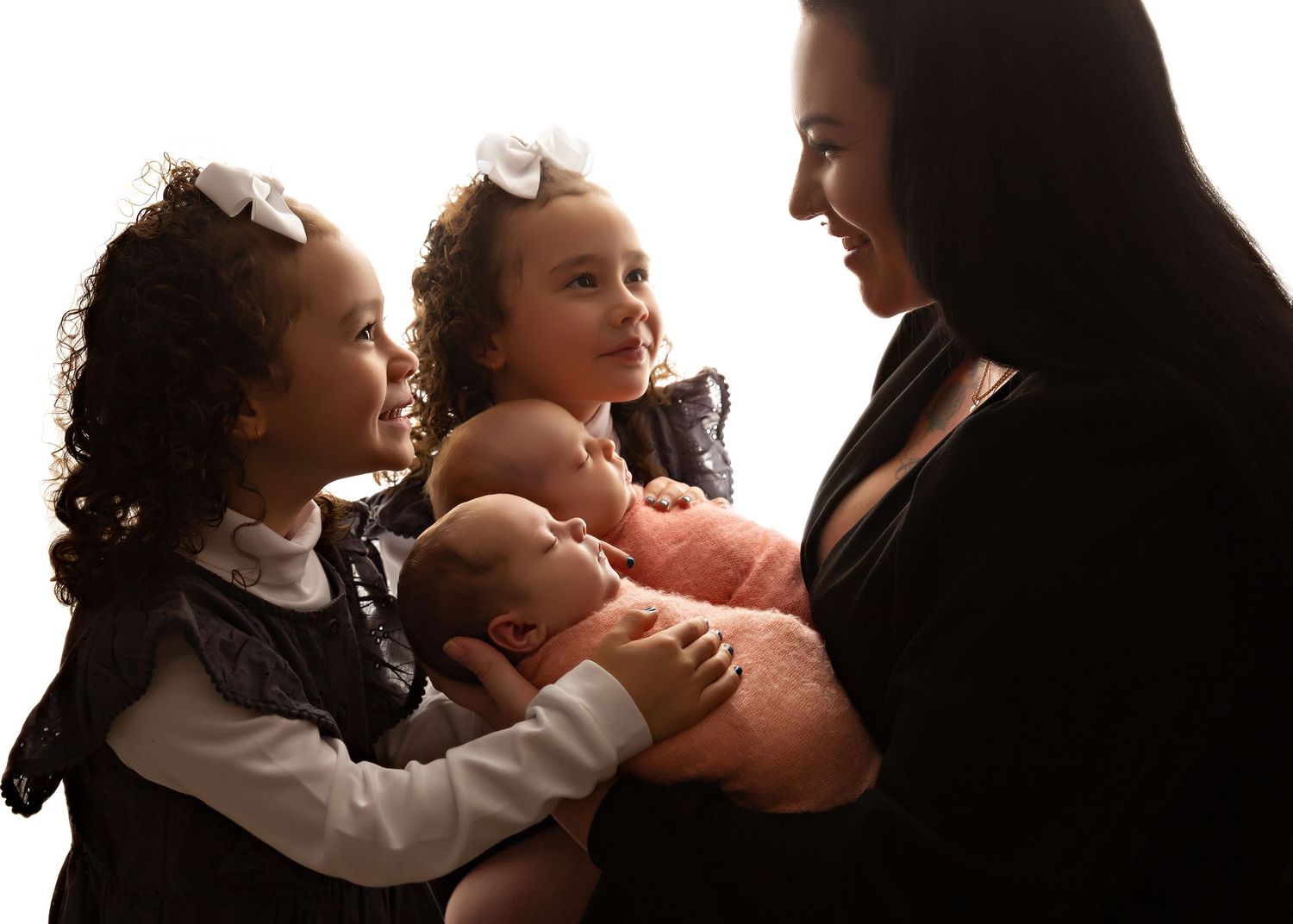 Silhouette series of tender family moments against white background.oowoomba Photographer Toowoomba Newborn Photographer