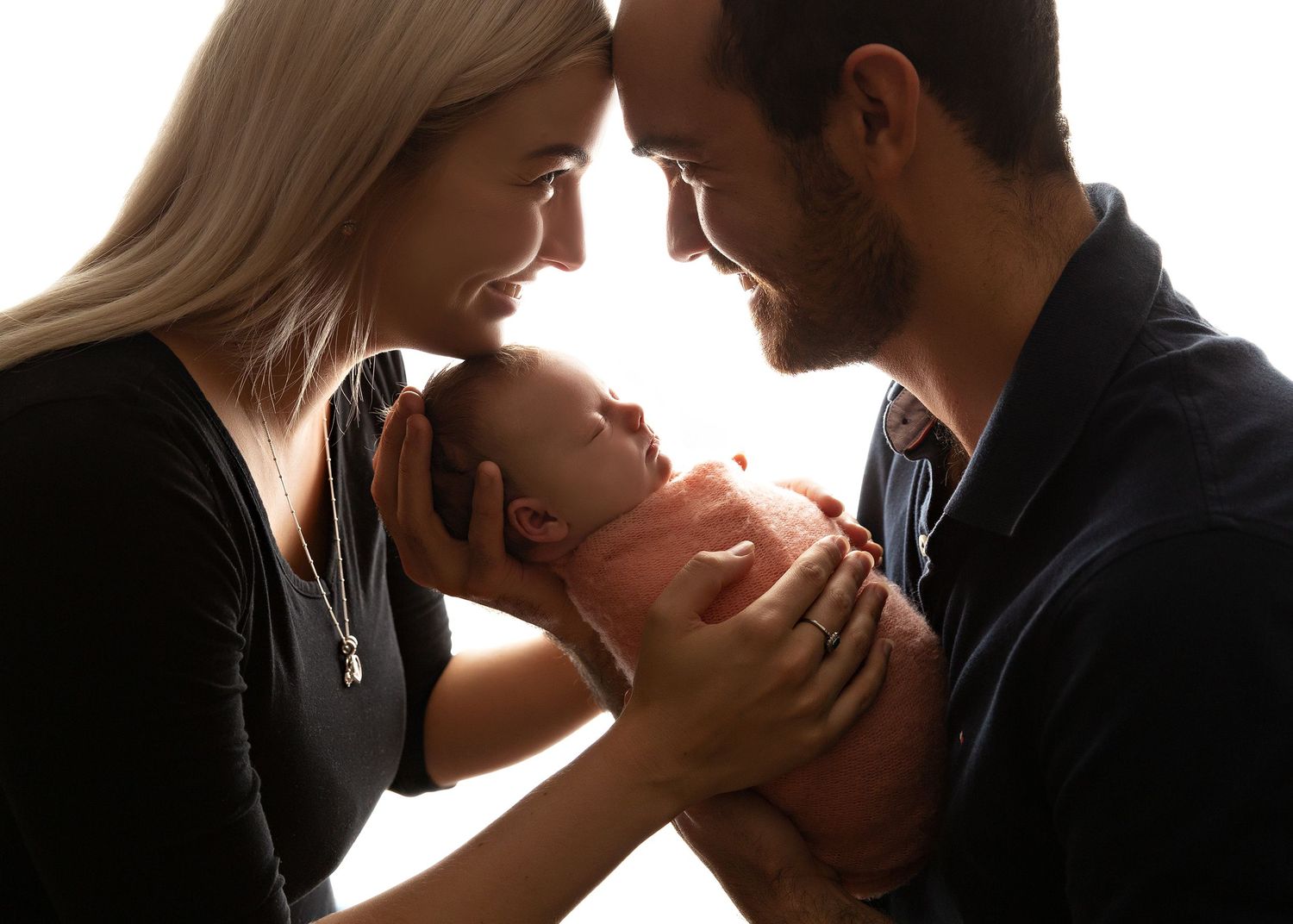 Intimate silhouette portraits with dramatic backlighting creating romantic atmosphere.Toowoomba Photographer Toowoomba Newborn Photographer