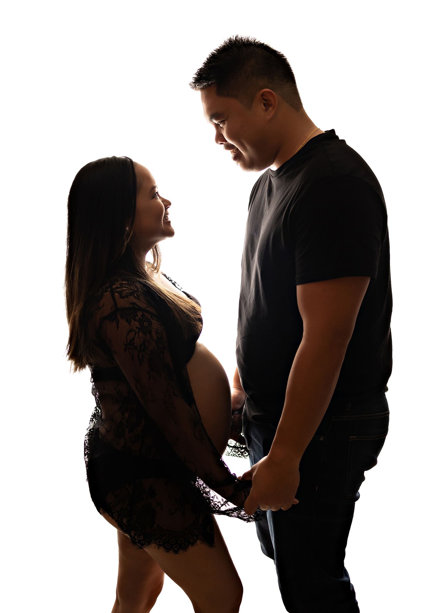 Silhouetted maternity photo sequence showing couple in intimate poses against bright backgroundToowoomba Photographer Toowoomba Newborn Phot