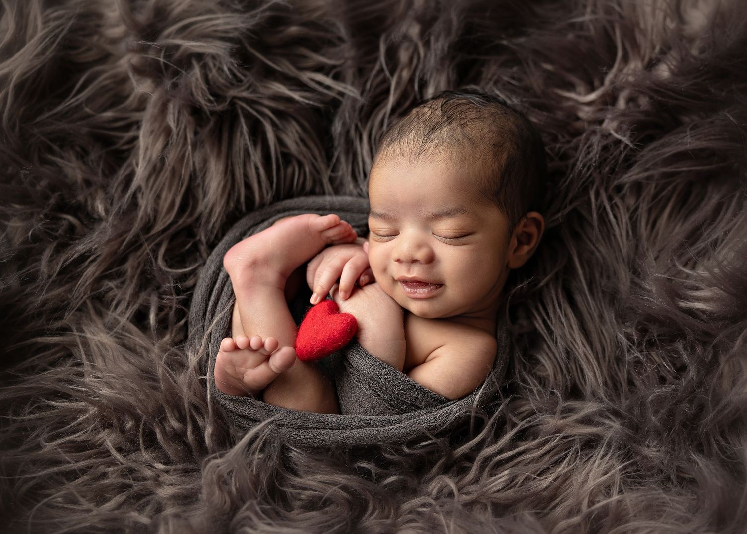 Collection of peaceful sleeping baby portraits on dark furry backdropToowoomba Photographer Toowoomba Newborn Photographer