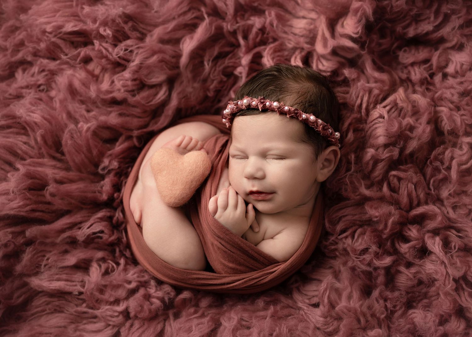 Series of newborn baby portraits on luxurious burgundy textured fabricToowoomba Photographer Toowoomba Newborn Photographer