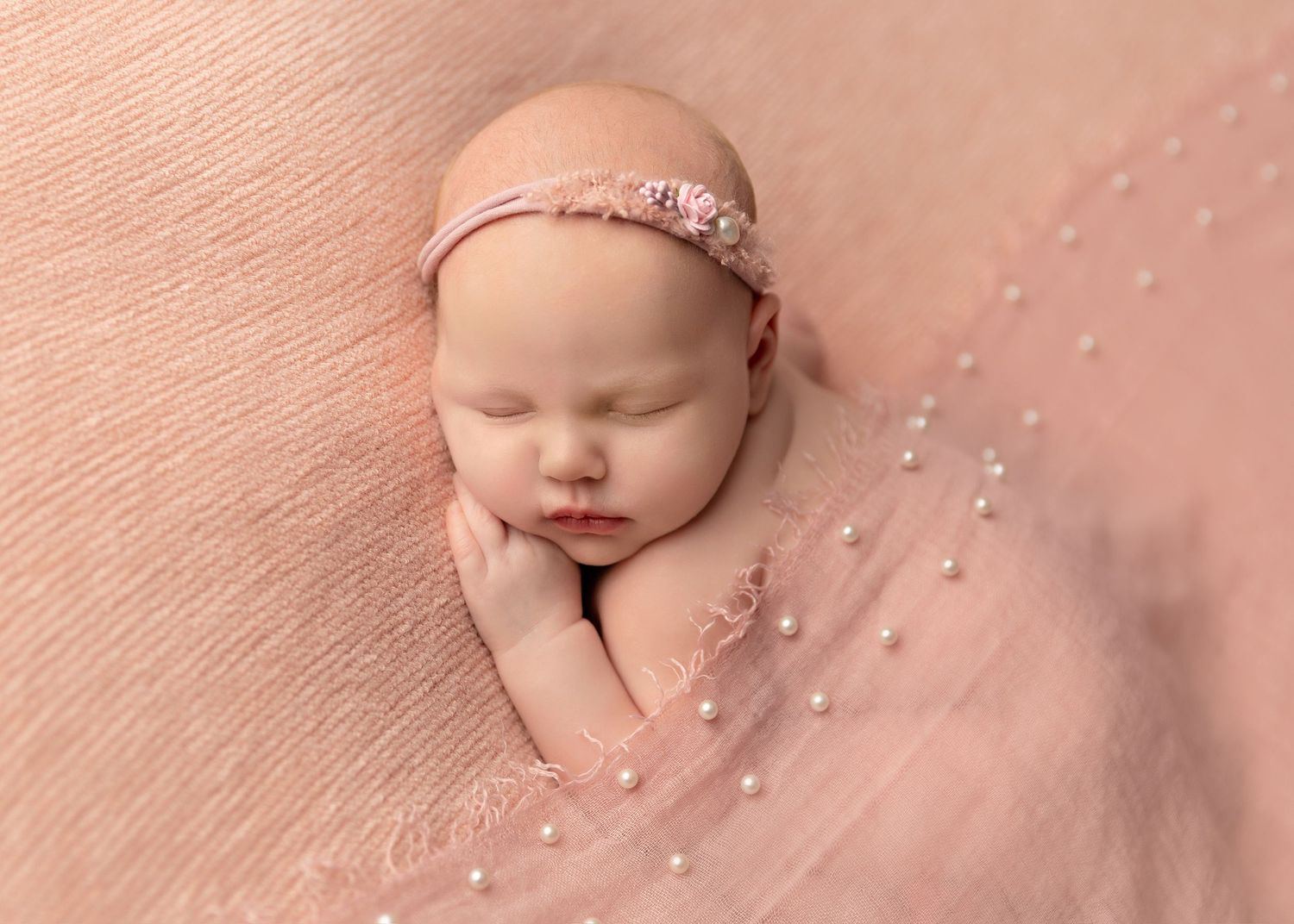 Close-up newborn photography with soft pink tones and delicate details Toowoomba Photographer Toowoomba Newborn Photographer