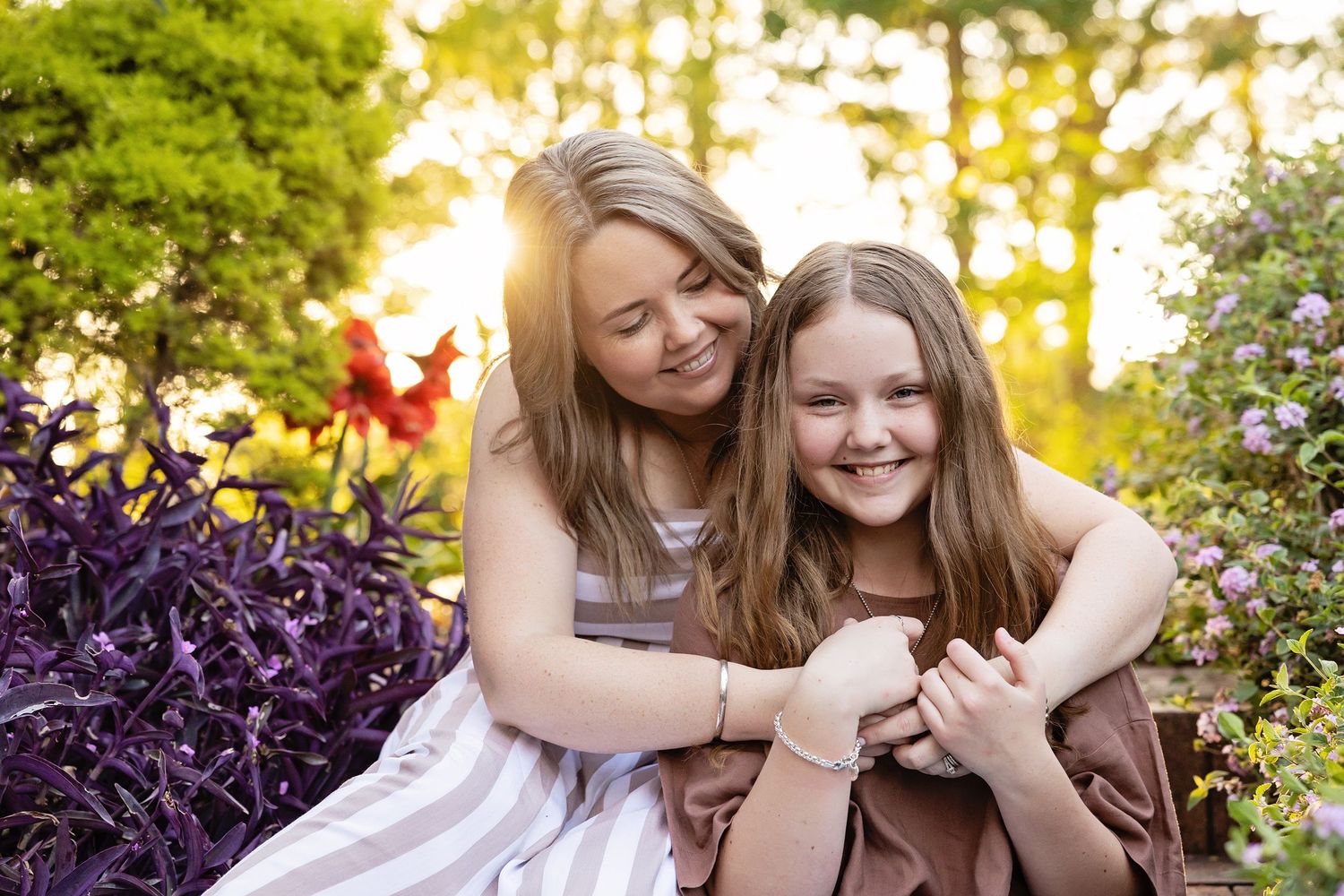 Candid outdoor mother and daughter portraits in golden sunlightToowoomba Photographer Toowoomba Newborn Photographer