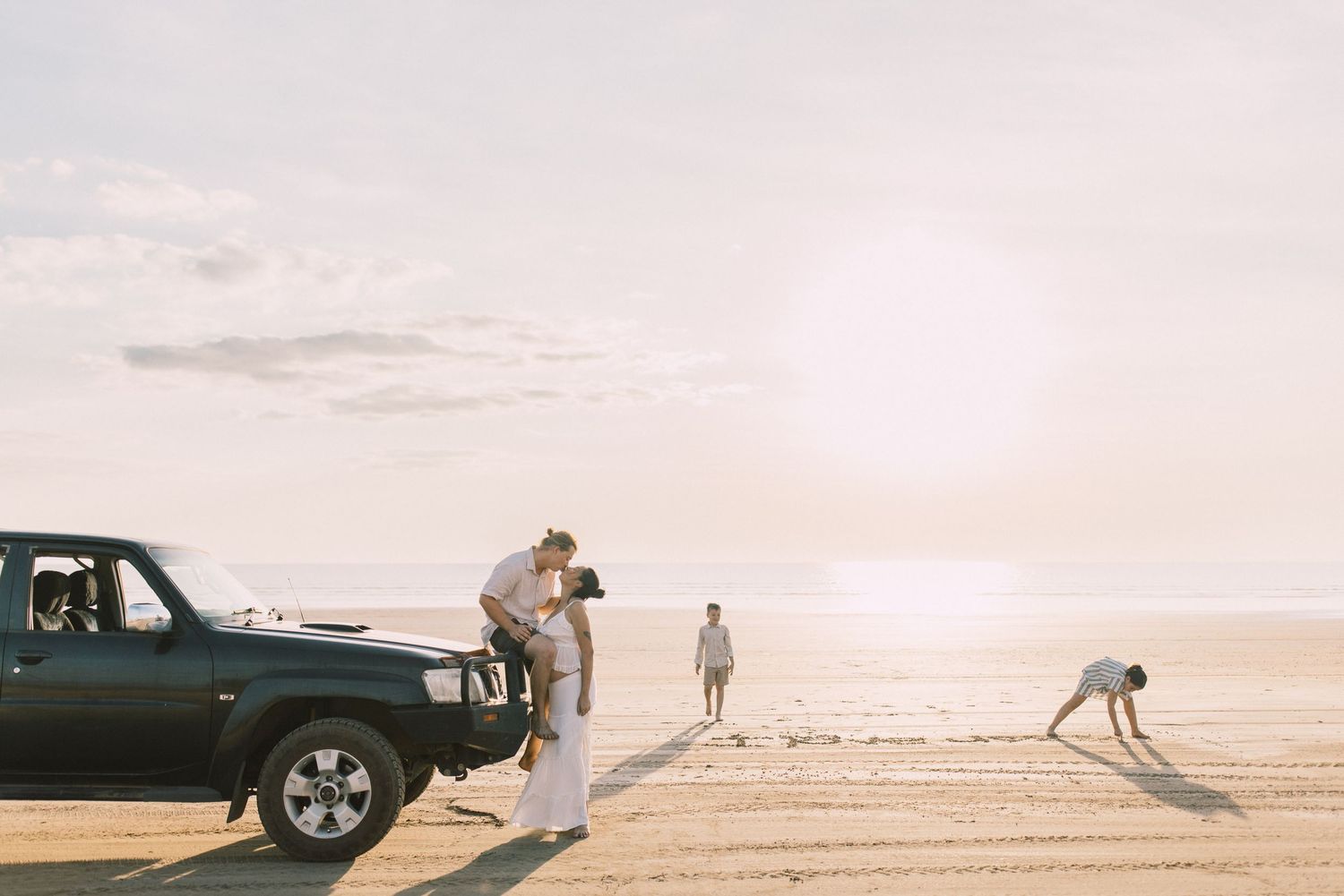 Darwin family session at the beach with car