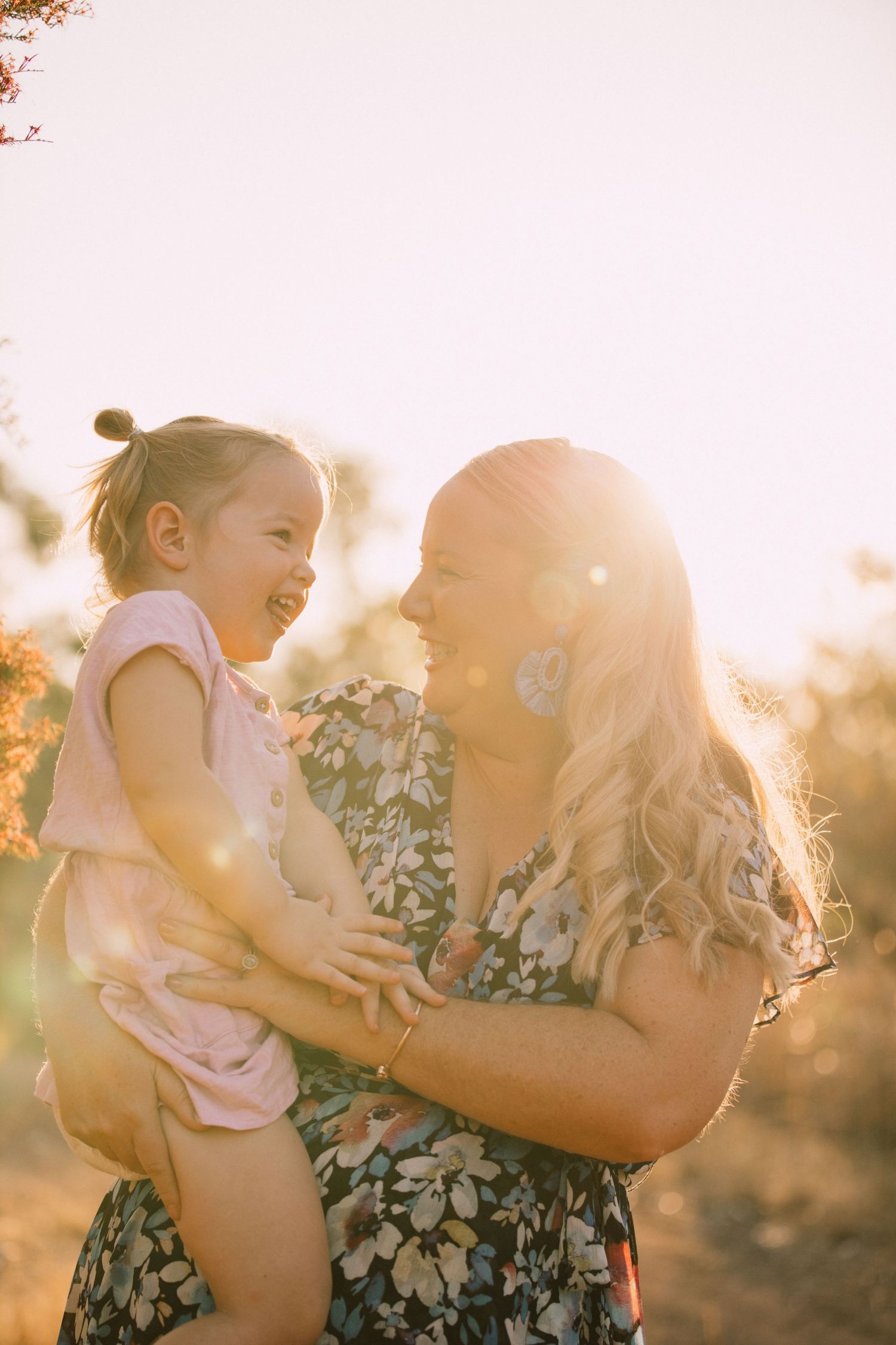 mother and daughter photo with sun flare