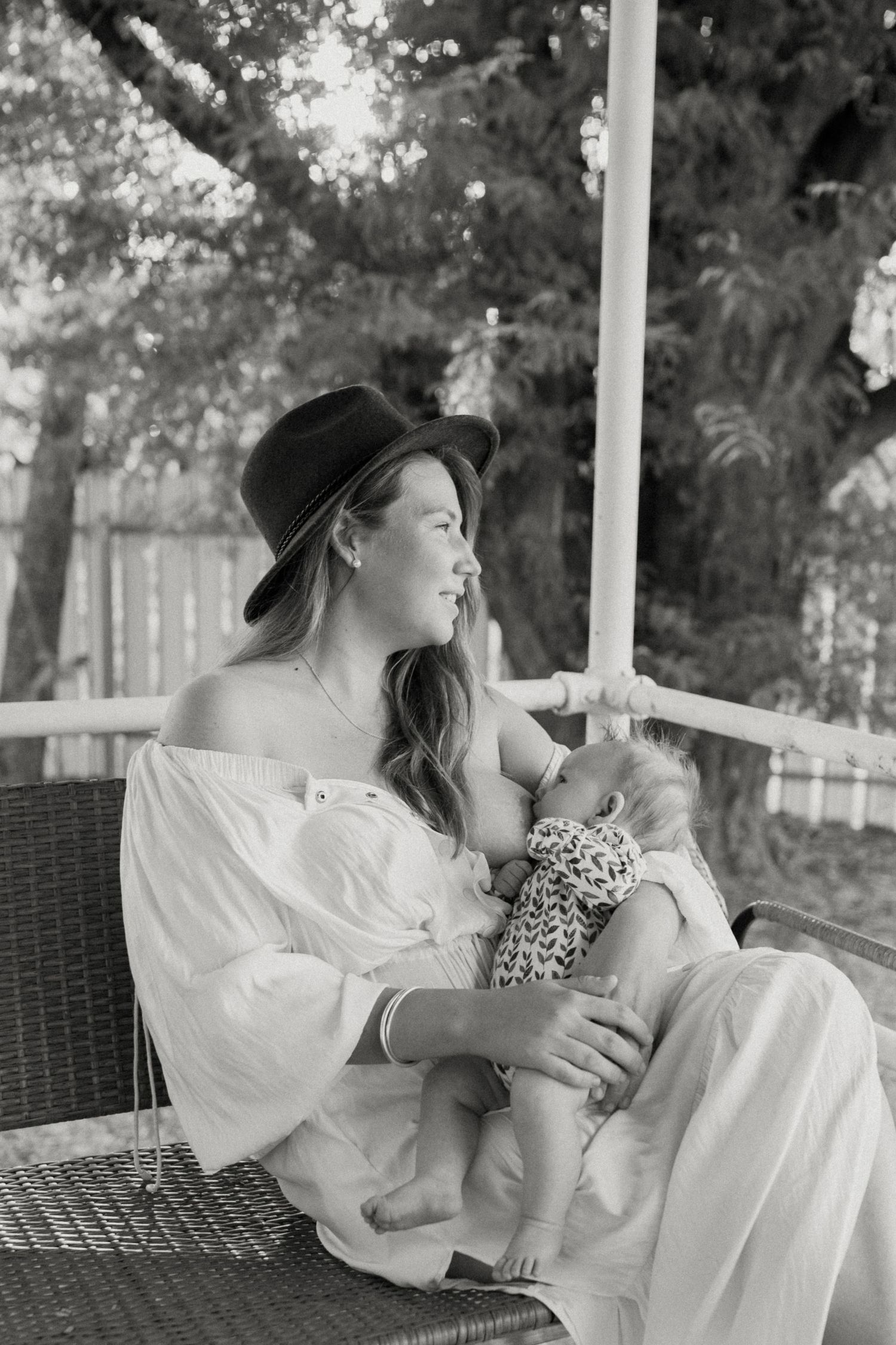 mother breastfeeding newborn baby