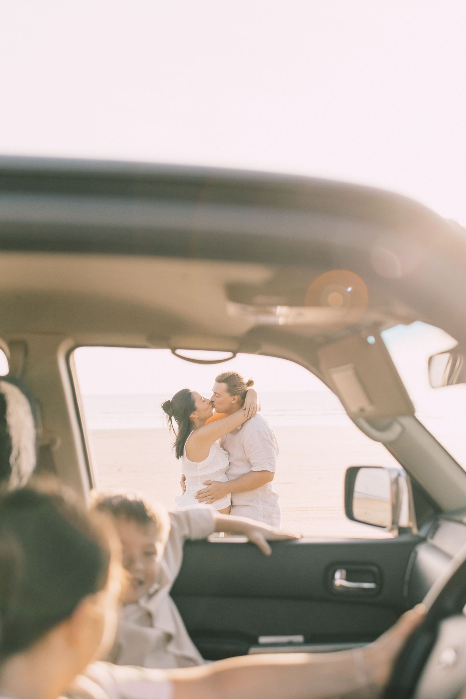 family playing in the car