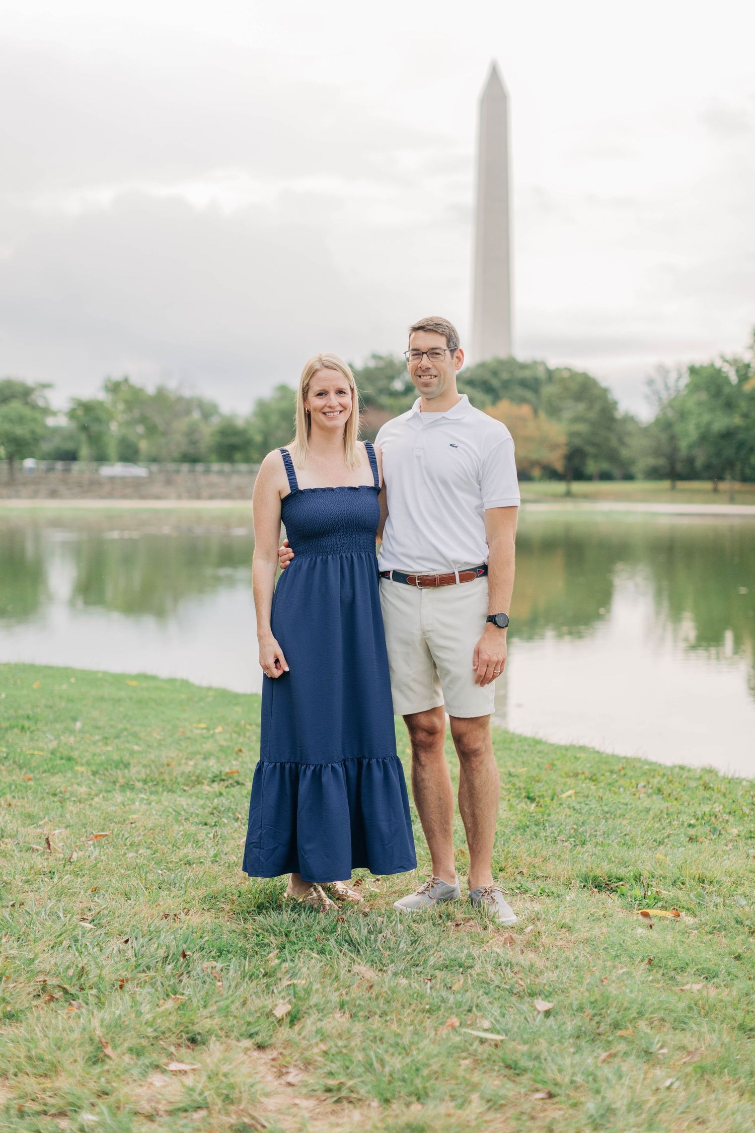 Family portrait session near the reflecting pool with Washington Monument in the background.