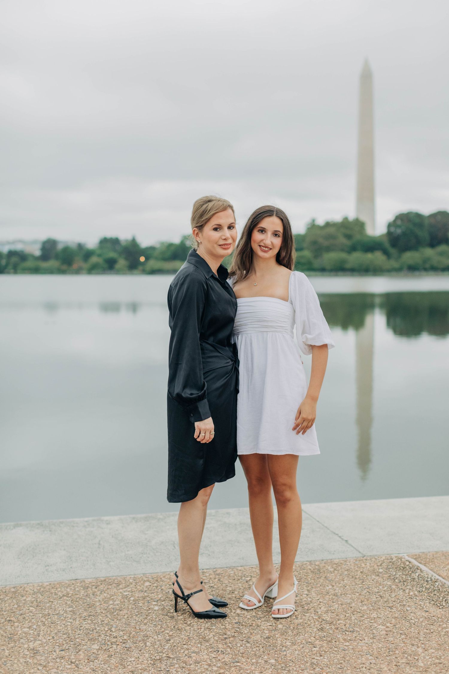 Sweet moment captured at the Tidal Basin with the Washington Monument in the background.