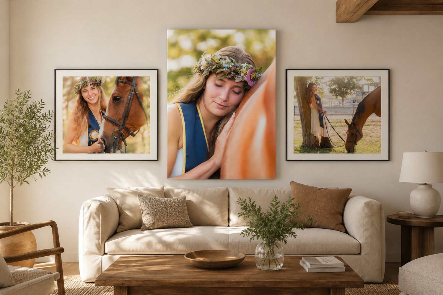 Framed equestrian portrait photos of a teenage girl with a horse displayed on a living room wall above a beige sofa.