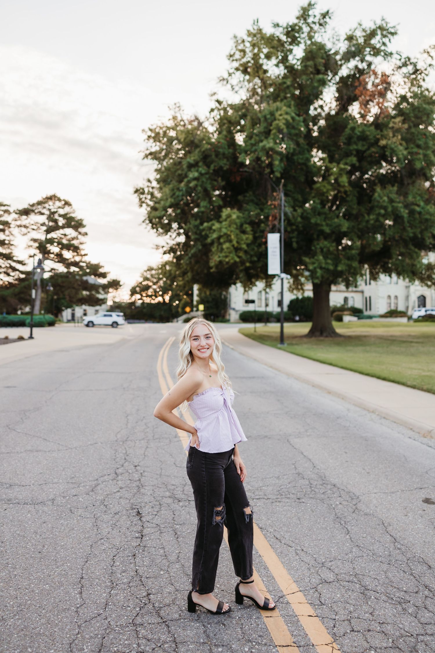 Street photography sequence with casual poses on a suburban road.