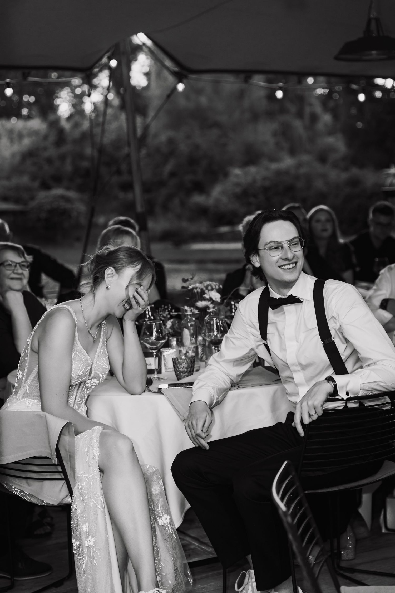 wedding guests candid moment black and white reception
