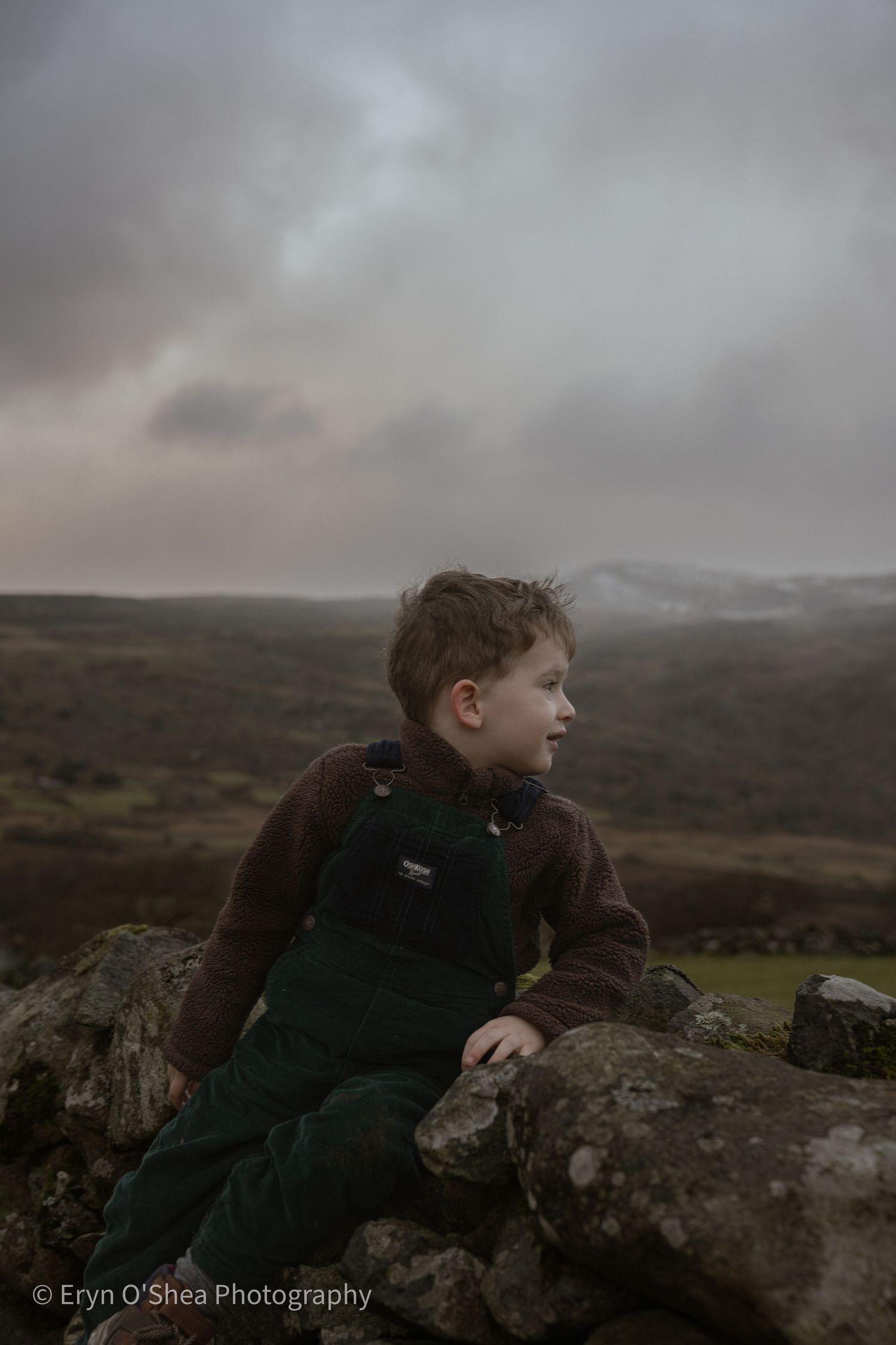 boy looking at mountain