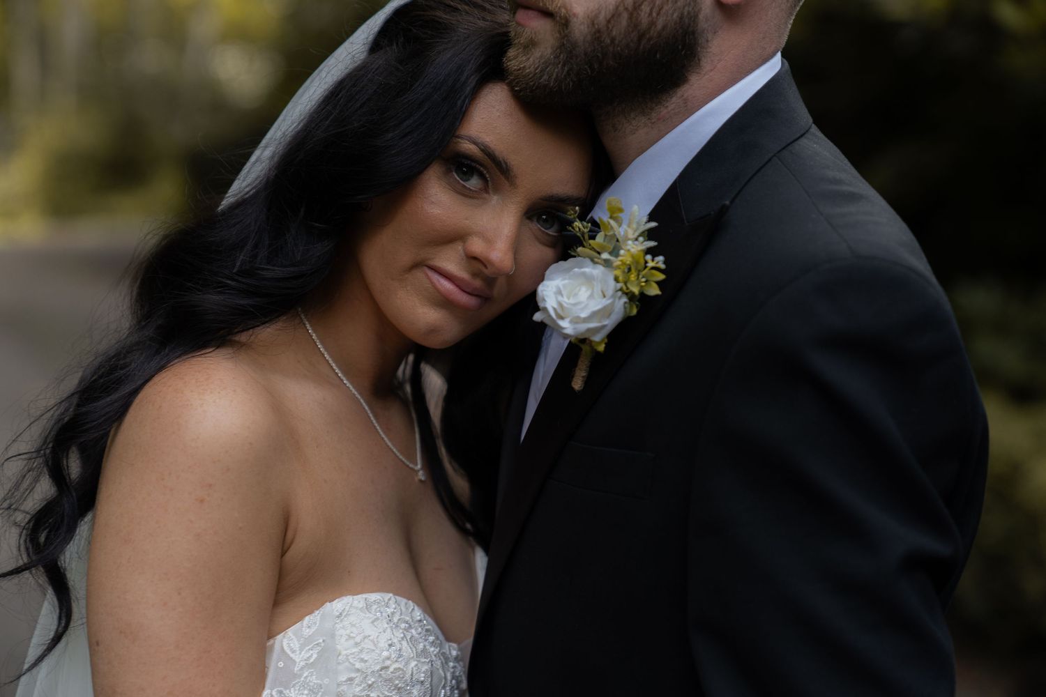 bride on the chest of groom