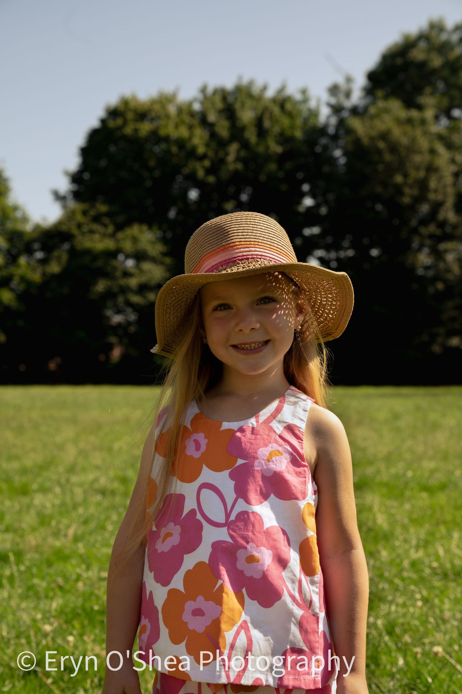 little girl posing in the sunshine