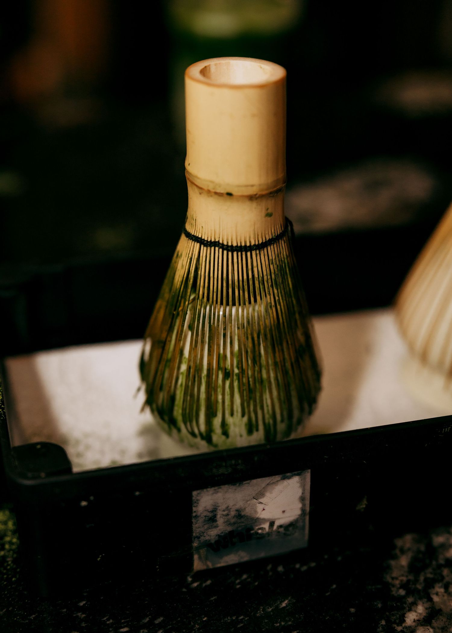 Detail shots of a bamboo whisk used in traditional tea ceremonies.