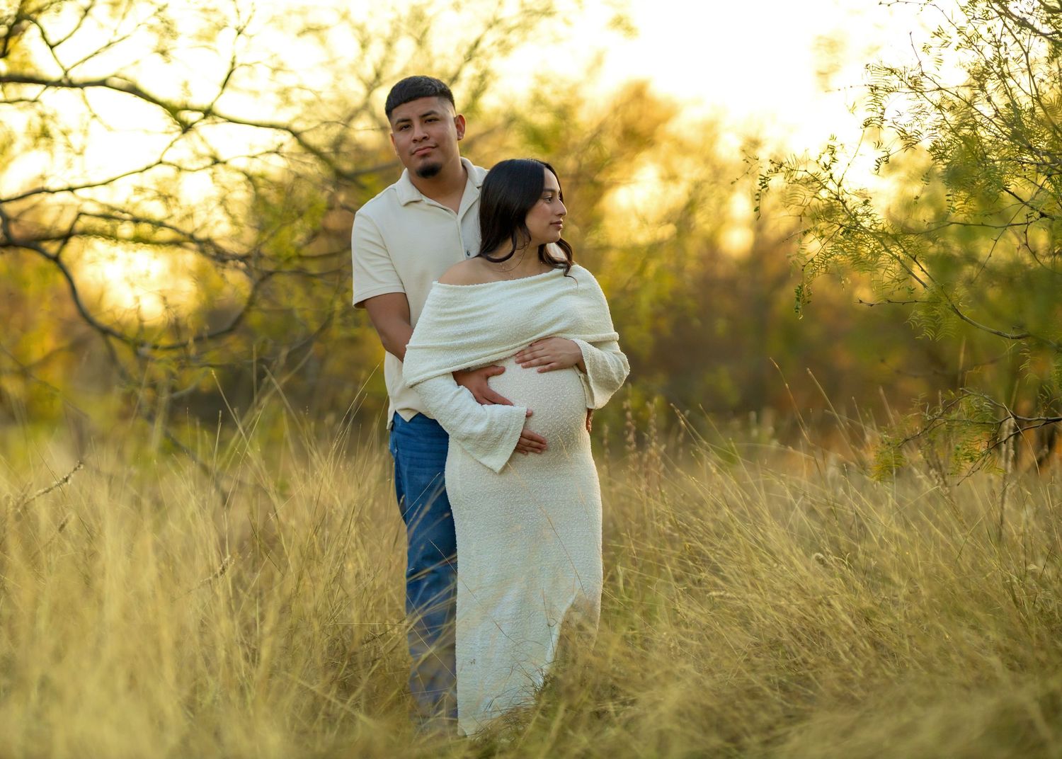 Golden hour photoshoot sequence in tall grass showing tender moments between a couple.