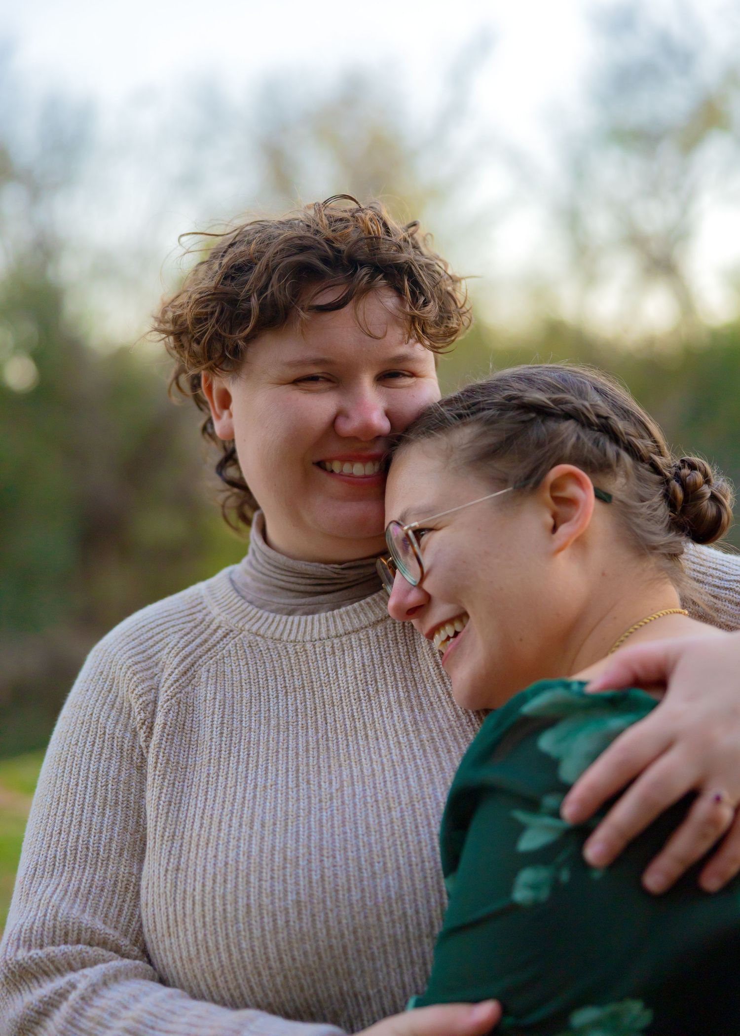 Candid sequence showing a couple sharing joyful laughter while embracing outdoors.