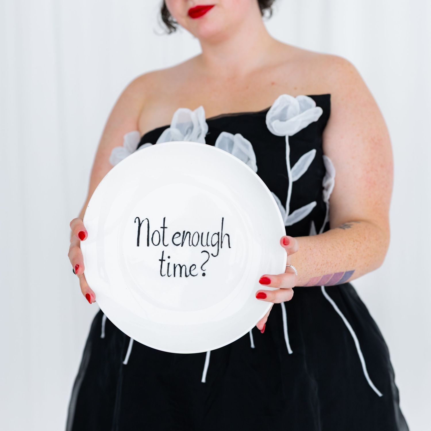 A series of white speech bubbles with text asking about time against a black and white background.