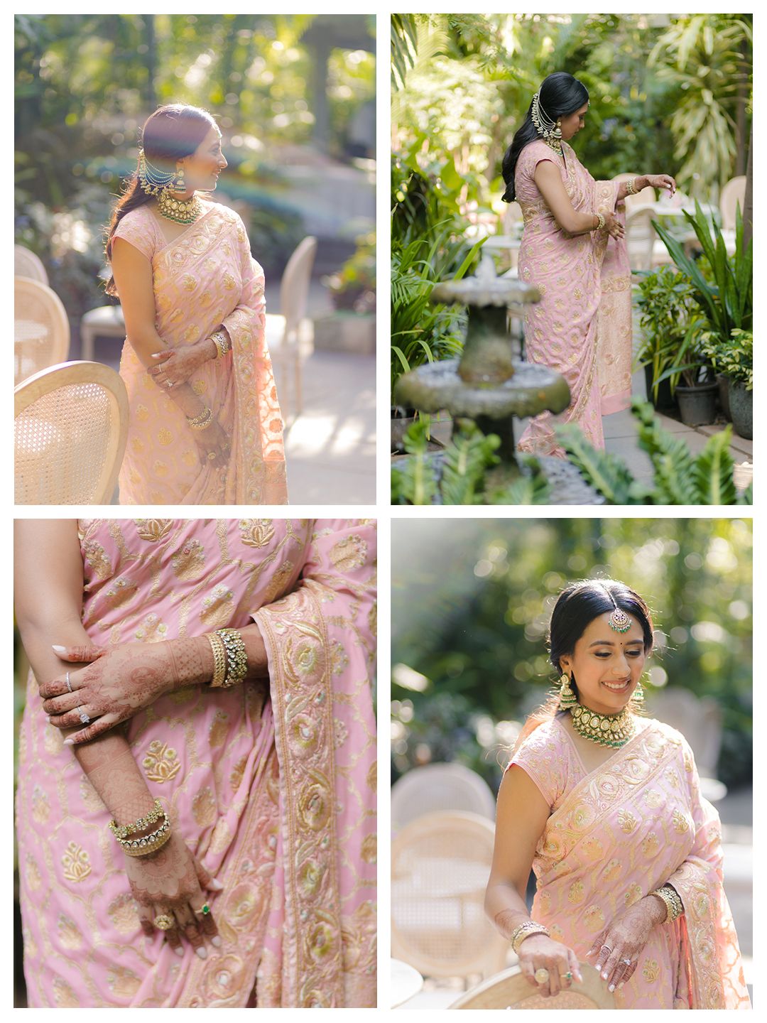 Bride in pink embroidered saree with gold jewelry poses in garden setting with fountain backdrop.