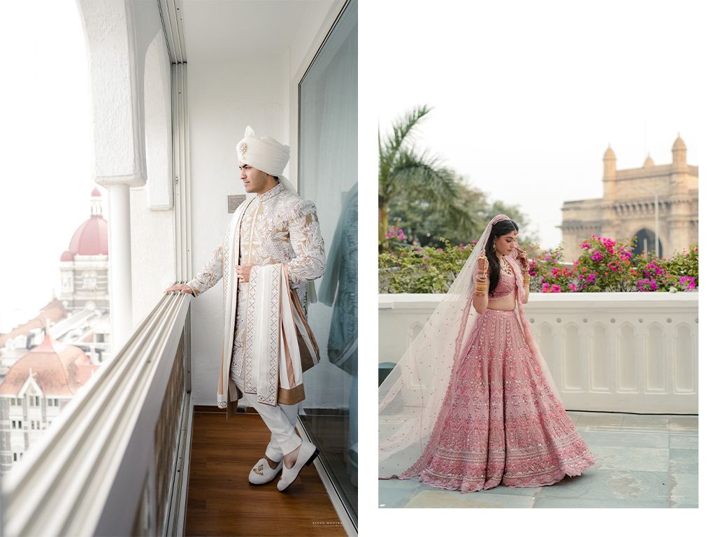 Indian groom in white sherwani on balcony and bride in pink lehenga near Gateway of India.