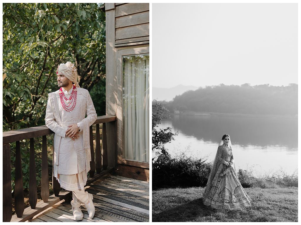 Indian groom in cream sherwani on wooden deck beside black and white photo of bride by lake.
