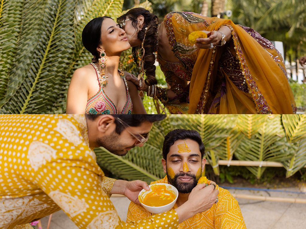 Indian couple celebrating vibrant Haldi ceremony with turmeric, surrounded by guests in yellow outfits.