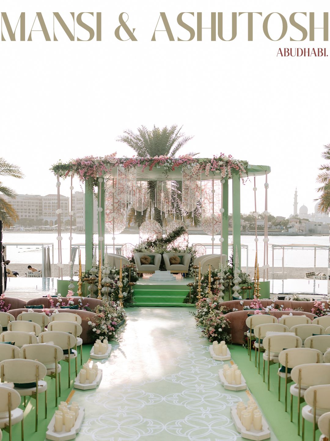 Elegant green and white outdoor Indian wedding mandap setup in Abu Dhabi waterfront.