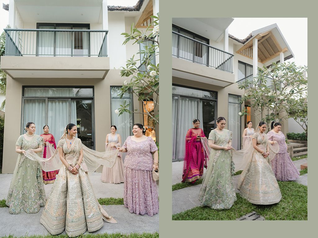 Bridesmaids in pastel lehengas pose together outside a modern villa during an Indian wedding celebration.