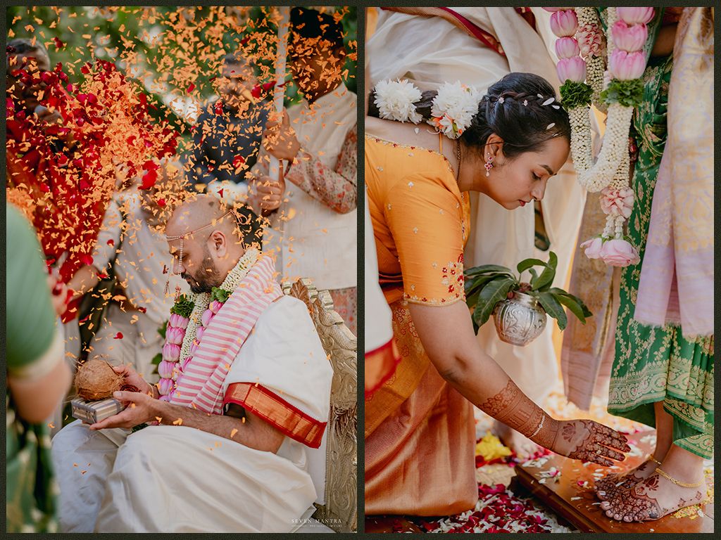 Groom receives flower petals during South Indian wedding rituals as a woman performs traditional ceremonial foot washing.