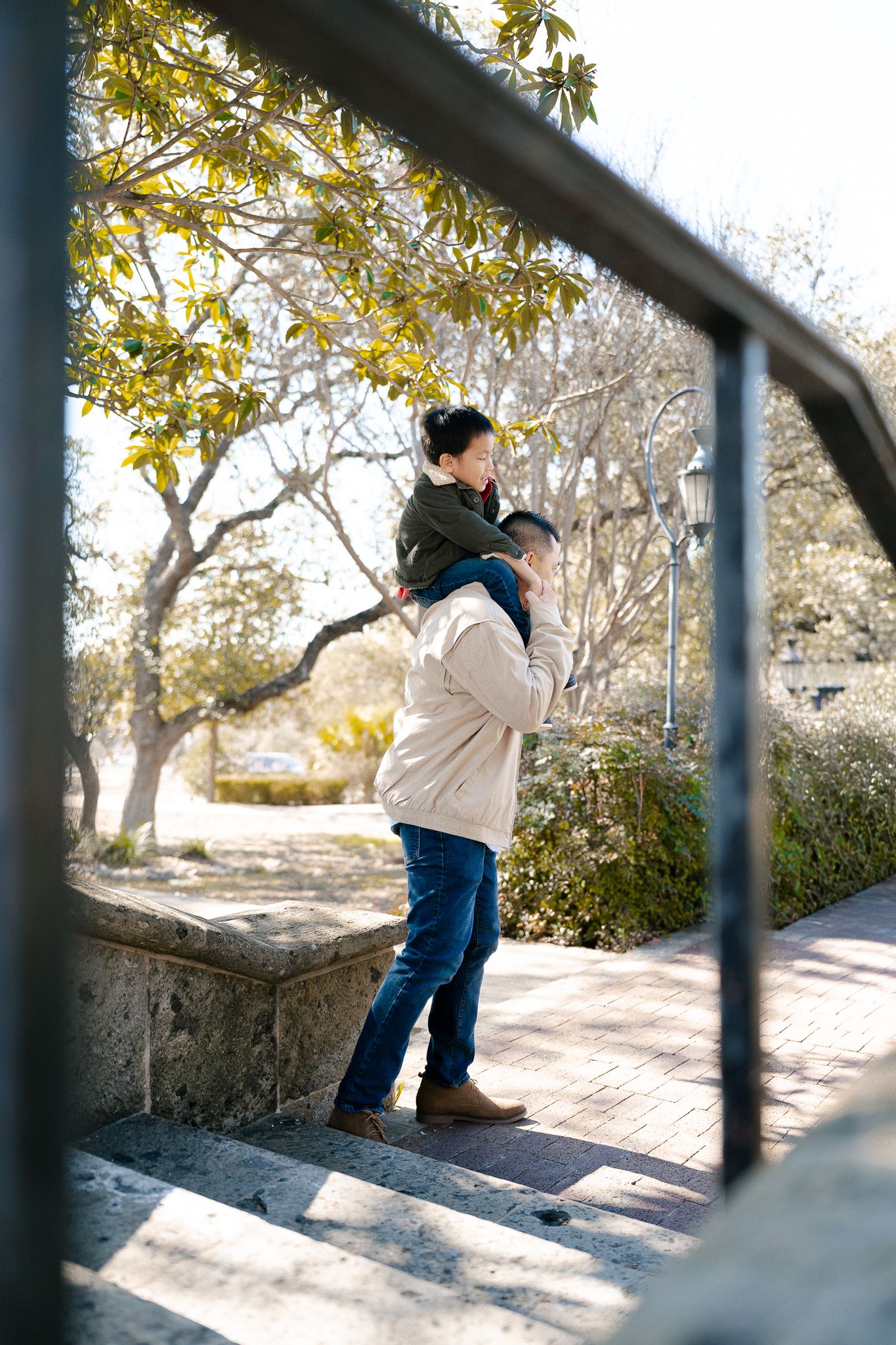 Three connected photos show someone sitting and leaning on a concrete wall outdoors with autumn trees in the background.
