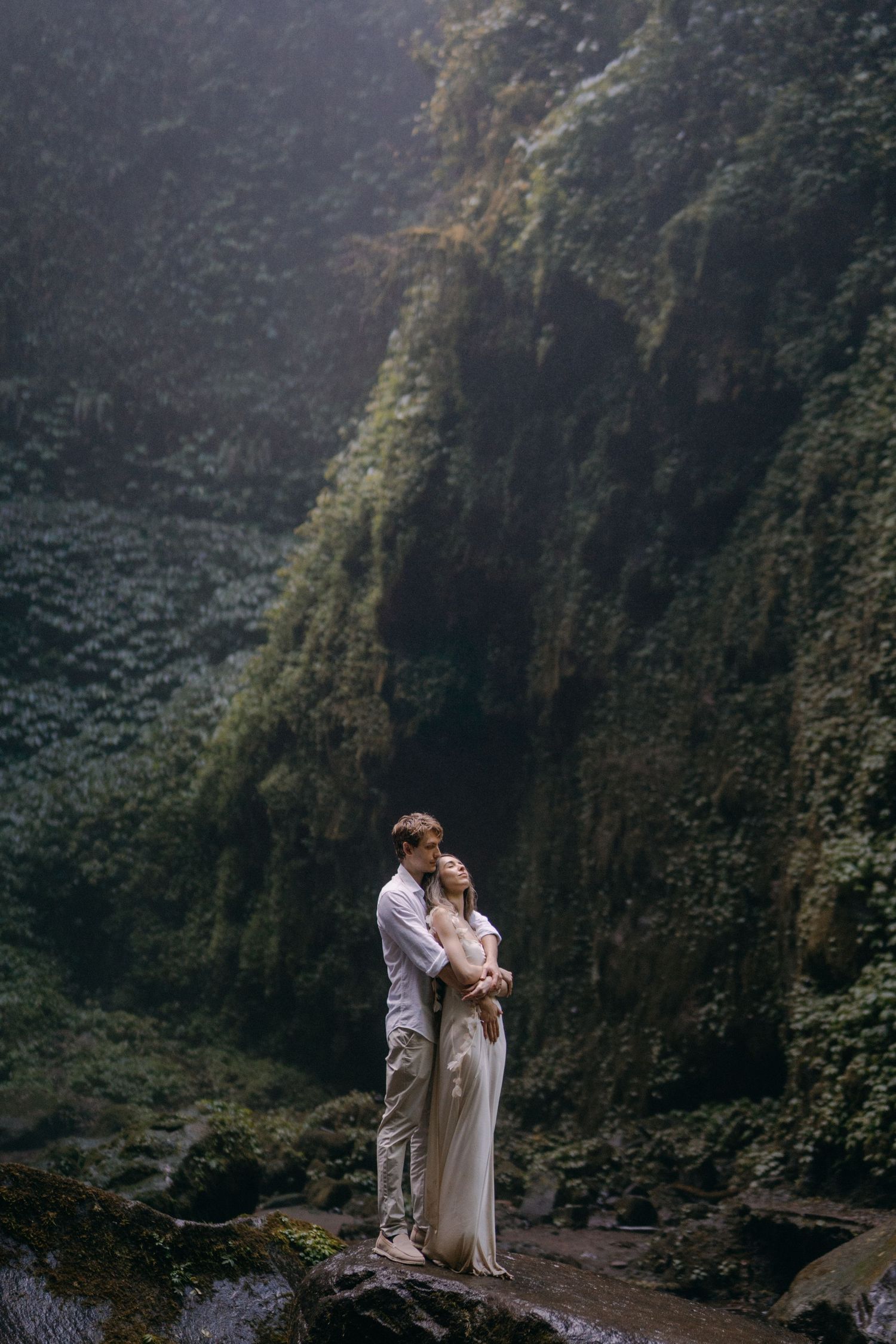 Romantic wedding photos captured in a dramatic mountain canyon setting.