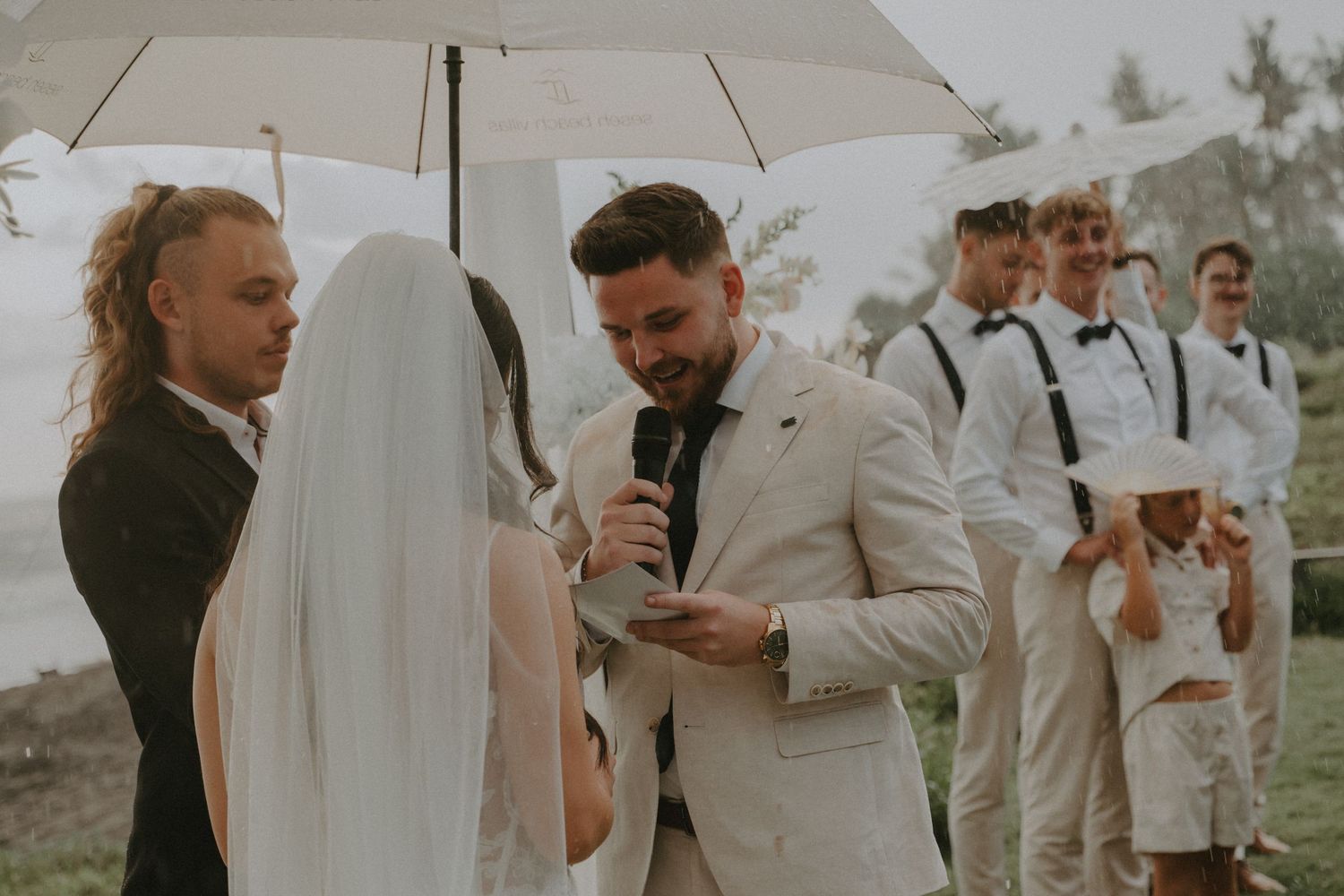 A series of wedding photos showing guests with umbrellas during an outdoor rainy celebration.