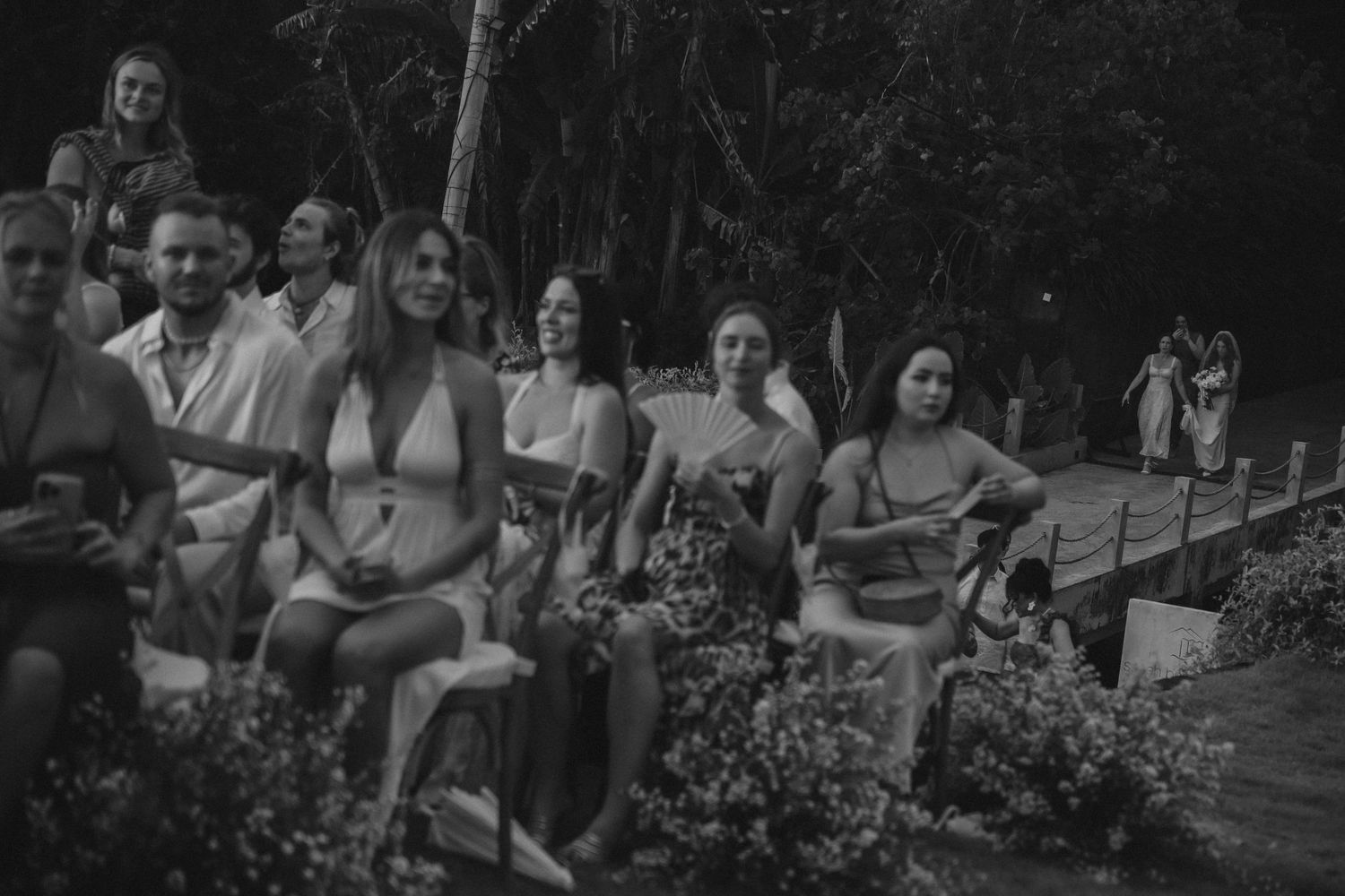 A collection of black and white vintage photographs showing people gathered outdoors for social activities.