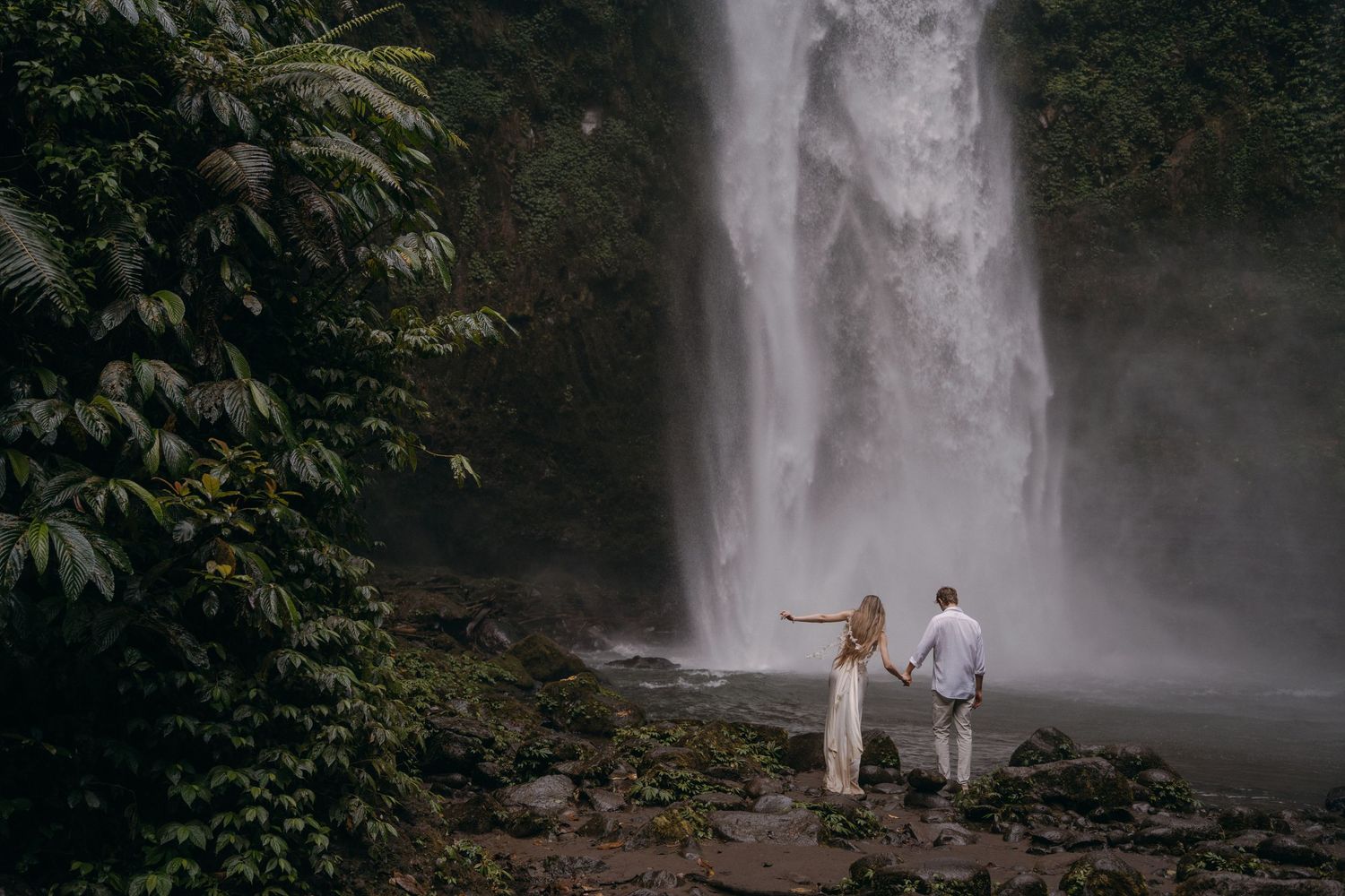 A collection of seven scenic waterfall photos showing the same cascading falls from different angles and perspectives.