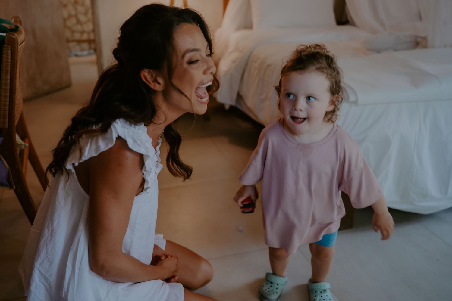 A heartwarming collection of candid family moments captured in soft, warm lighting shows playful interactions at home.