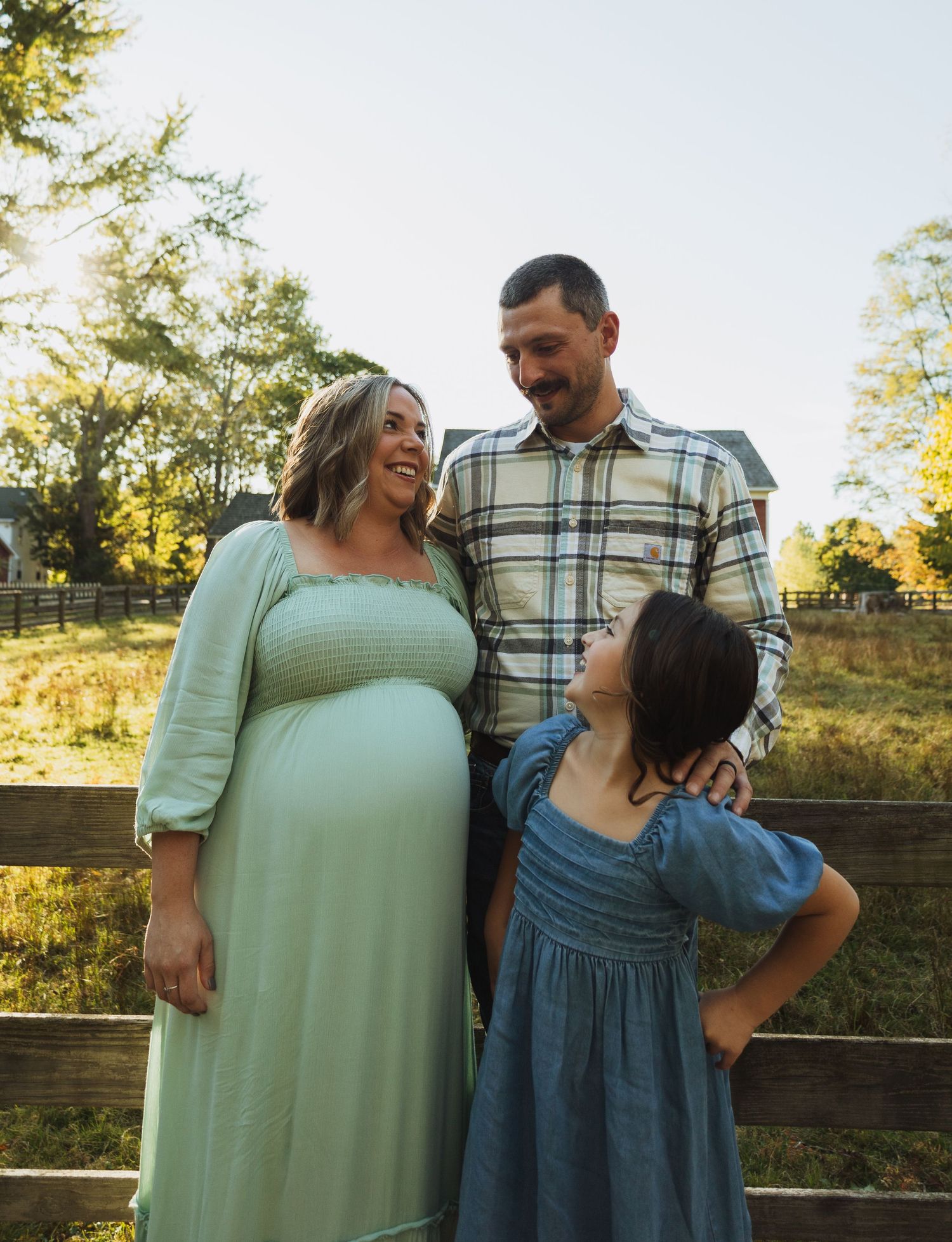 A couple shares joyful moments together in a series of outdoor photos at sunset, wearing casual attire.