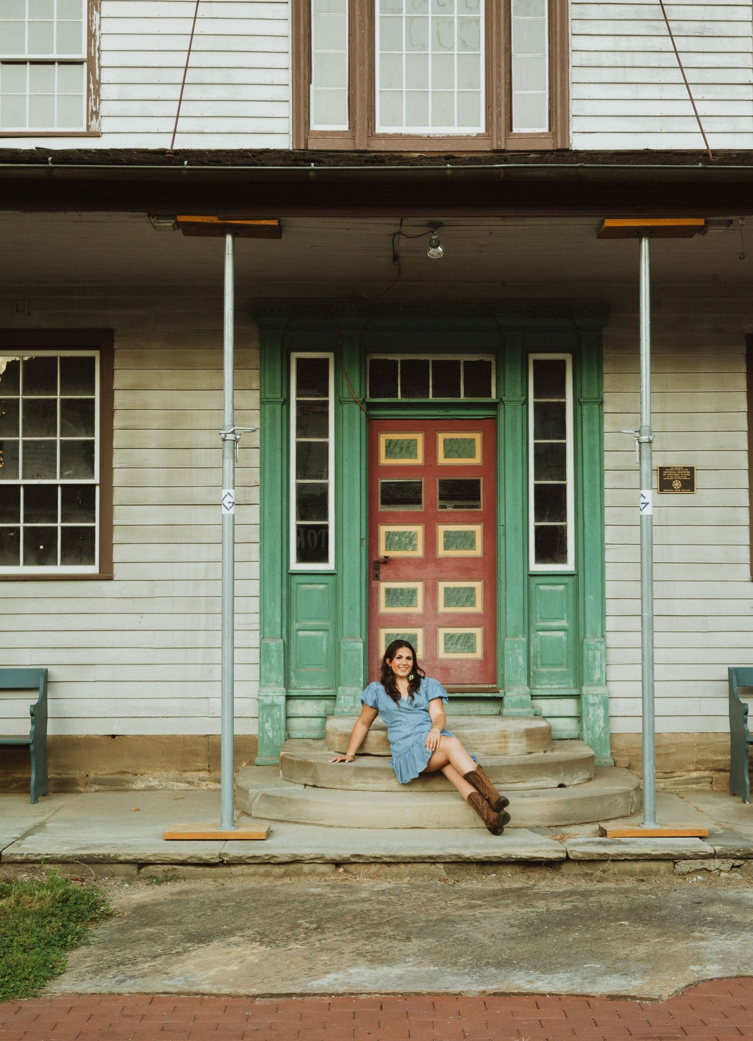 Historic building exterior with mint green doors and white siding captured in sequence.