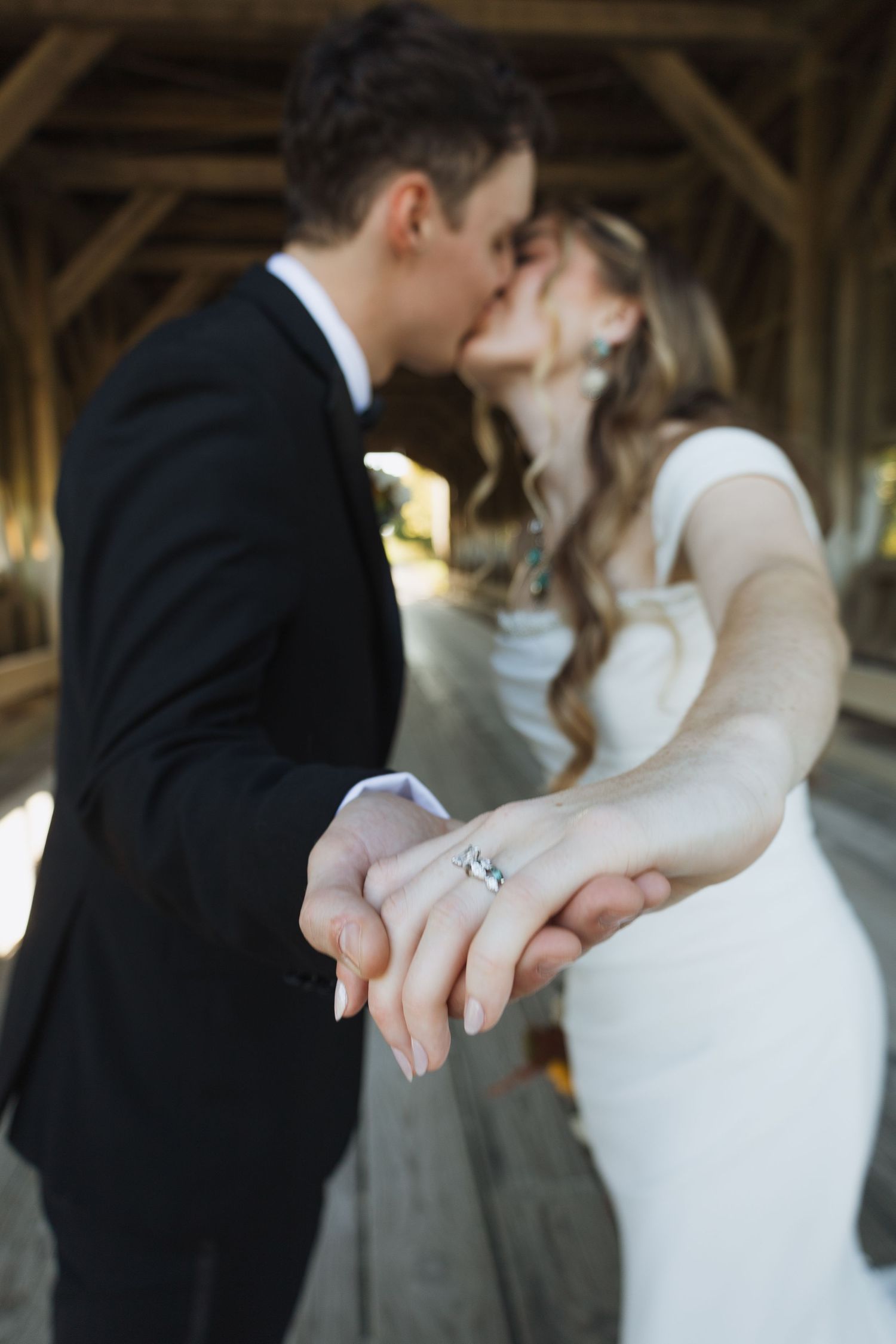 Close-up shots of an engagement ring being showcased in an intimate moment.