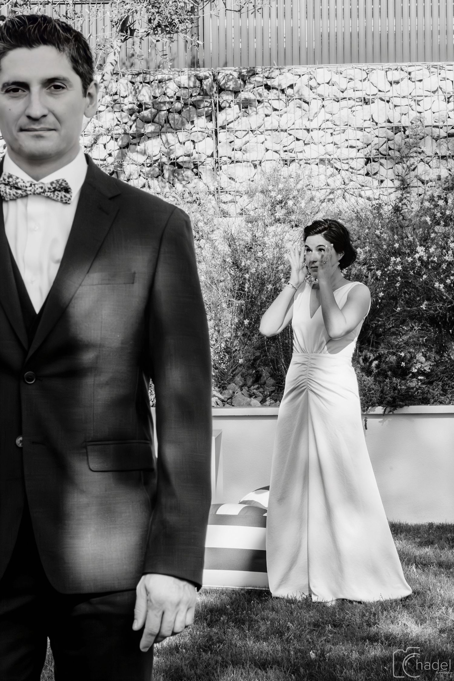 A black and white wedding photography collage showing romantic moments between a couple in formal attire outdoors.