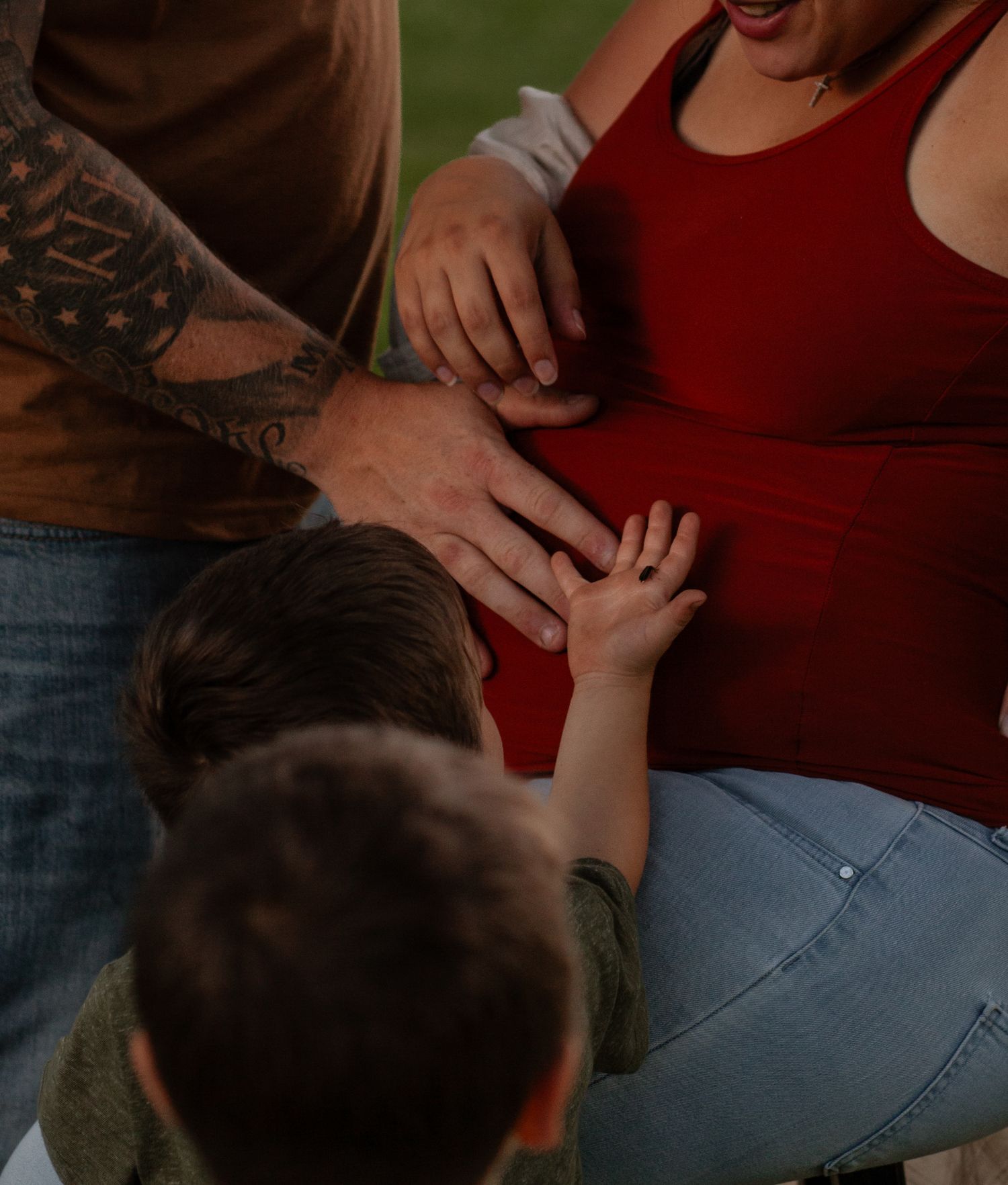 Close-up shot of a couple's tender moment during an outdoor photo session.
