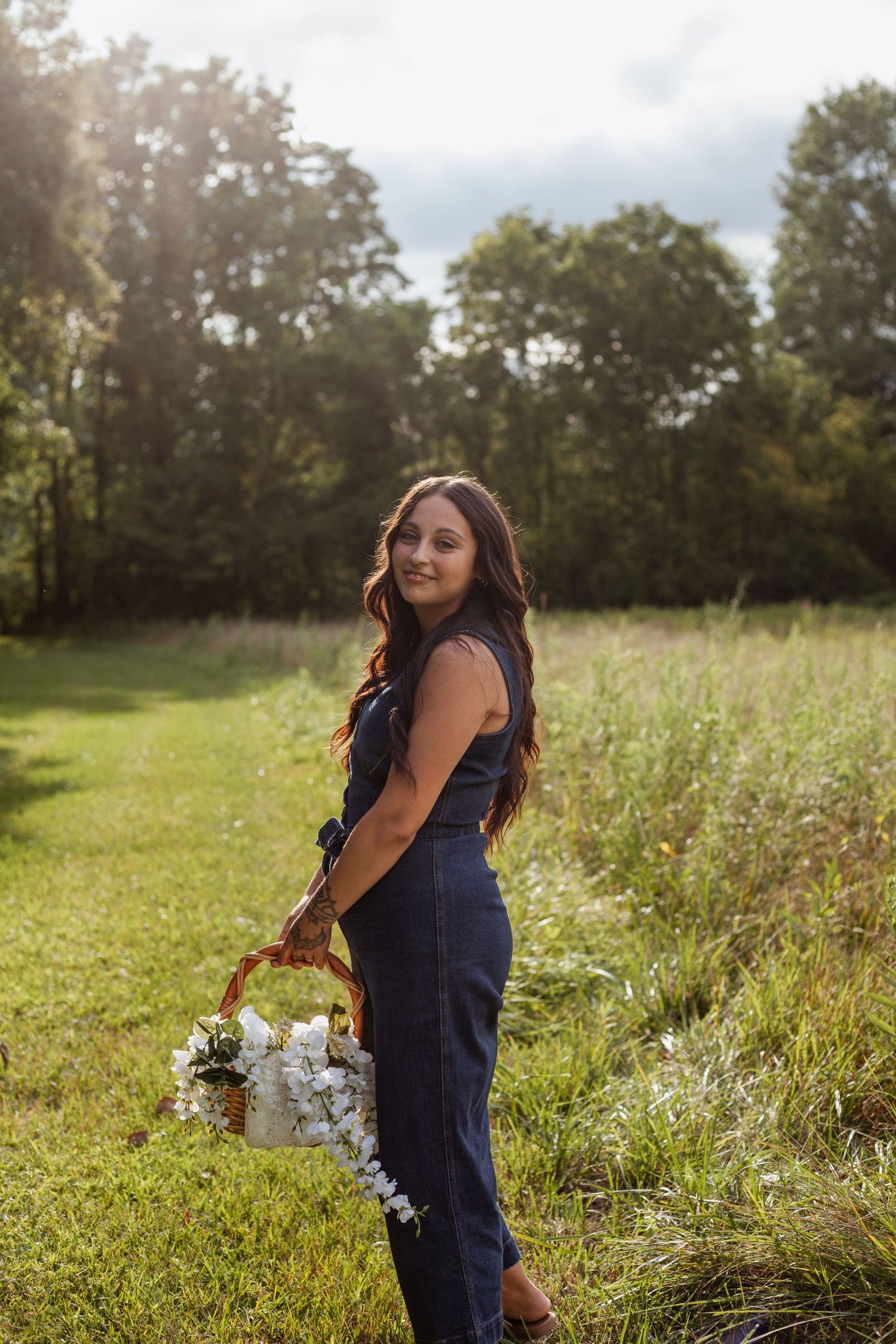 Candid shots in a sunny meadow with wildflowers and natural lighting.