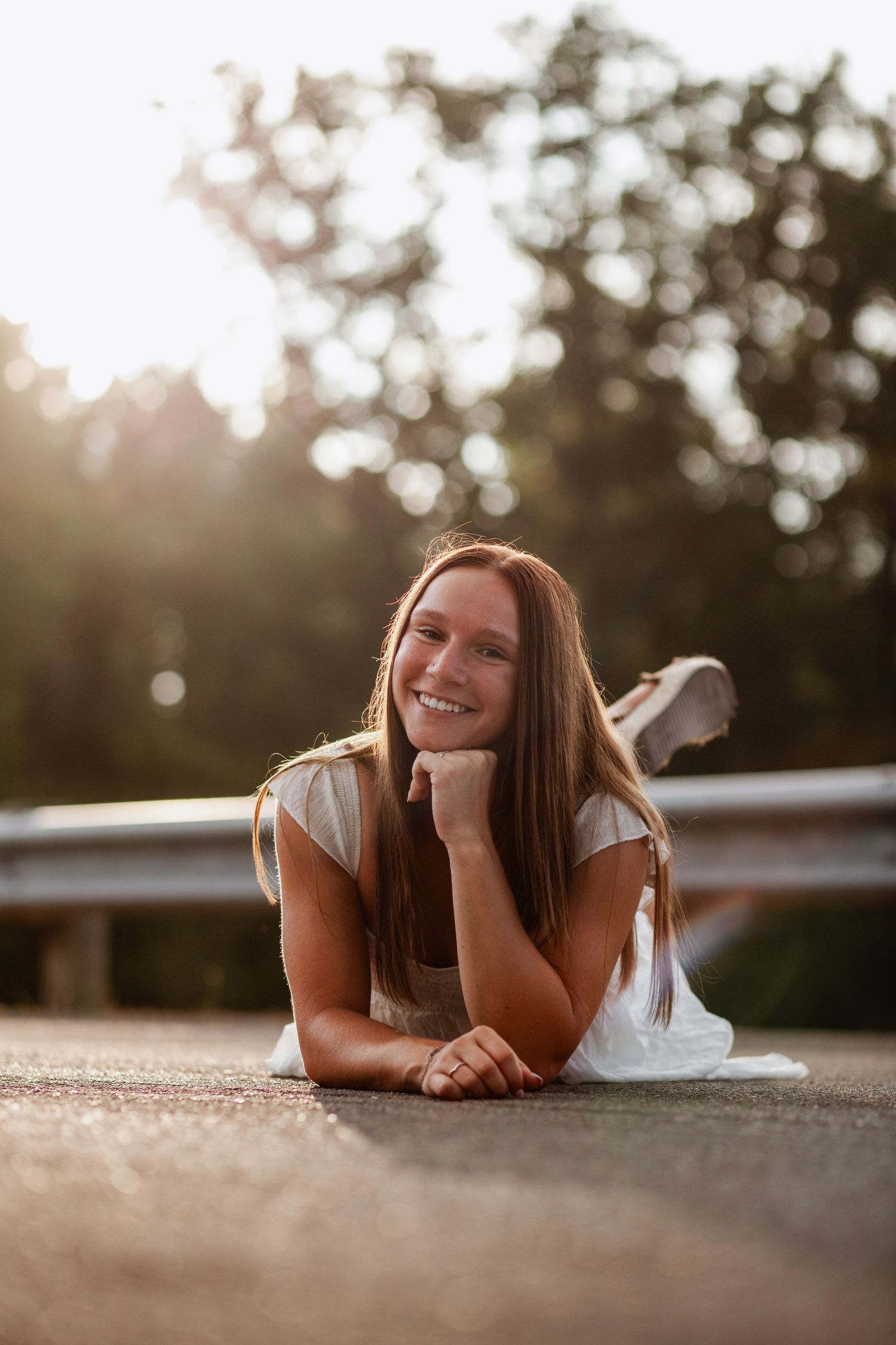 Candid outdoor portrait session with natural lighting and bokeh background effects.