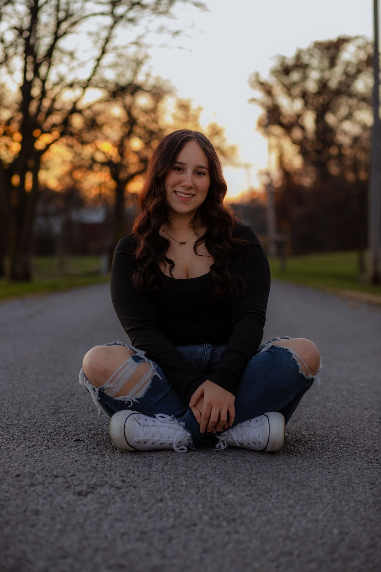 Casual outdoor photo series taken on a paved path during golden hour sunset.