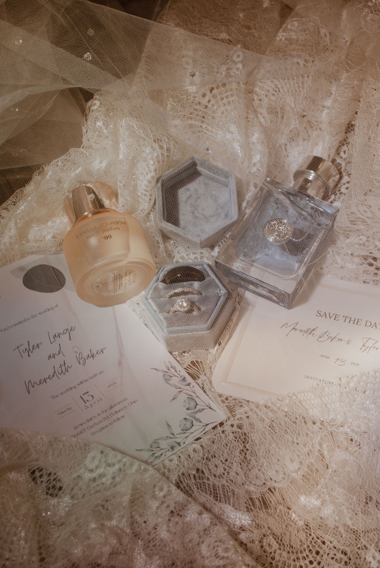 Vintage-style wedding decor and mementos laid out with handwritten notes.