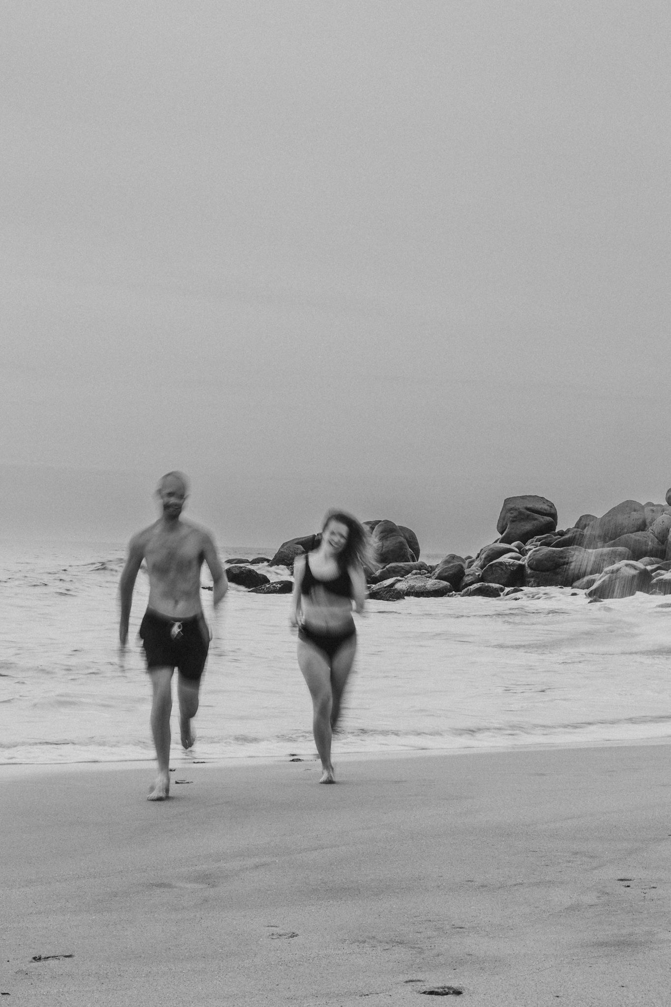 Photos of a couple on the beach taken by a Calgary Family Photographer.