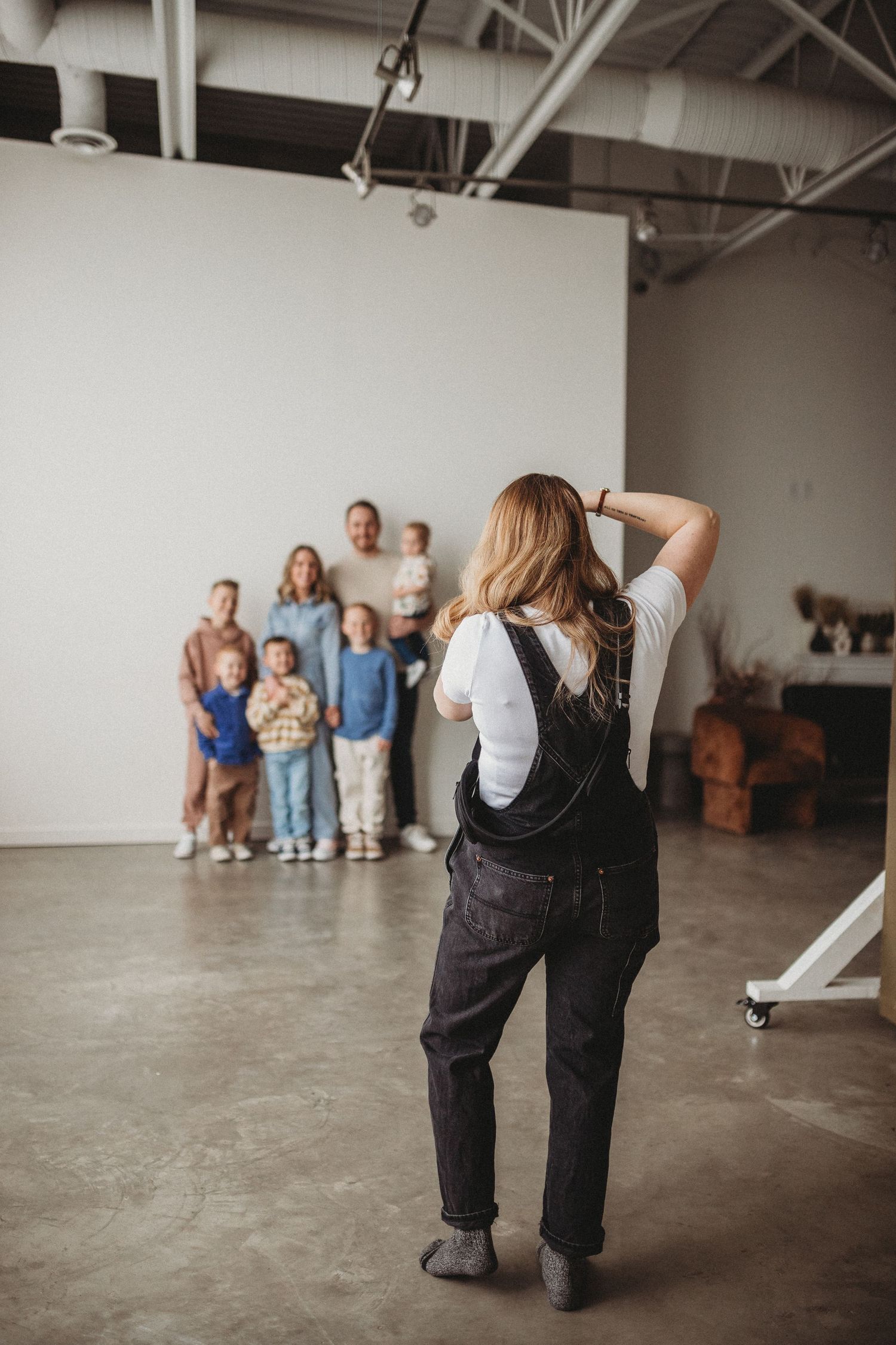Calgary family photographer takes photos of a young family during a mini sessions at The Gallery Studio in Calgary