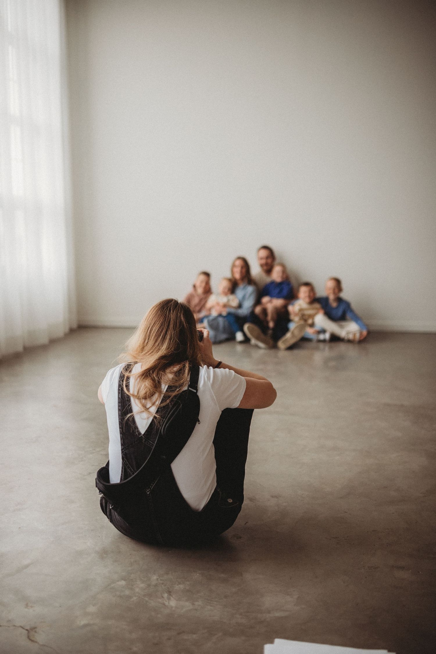 Calgary family photographer takes photos of a young family during a mini sessions at The Gallery Studio in Calgary